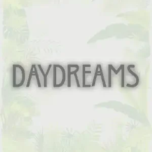 The word 'DAYDREAMS' written in bold letters on a pale, pastel-colored background.