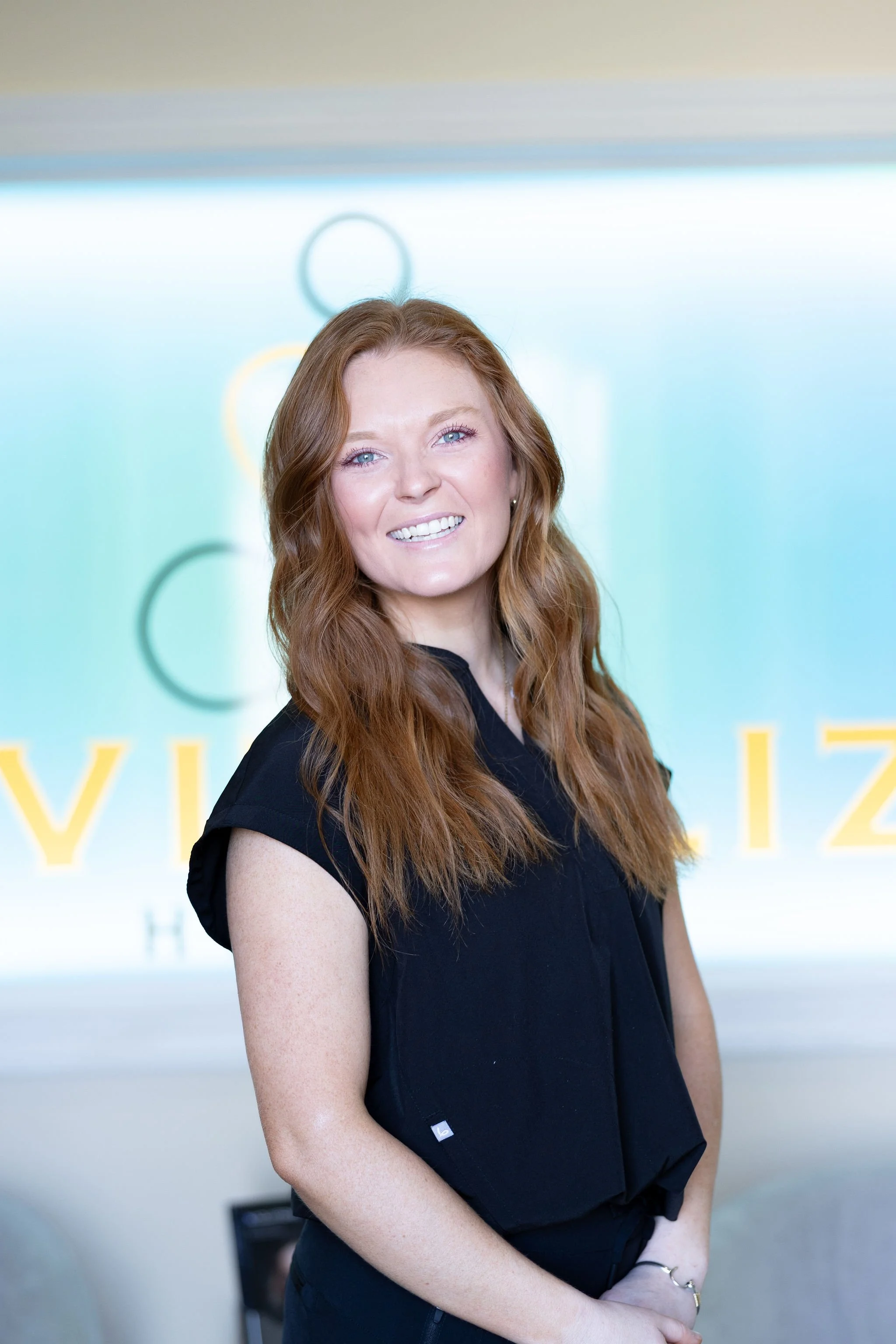 Hunter Prior, CMA at Revitalize Health in Florence,SC specializing in wellness services, labwork, aesthetic treatments, and spray tans.