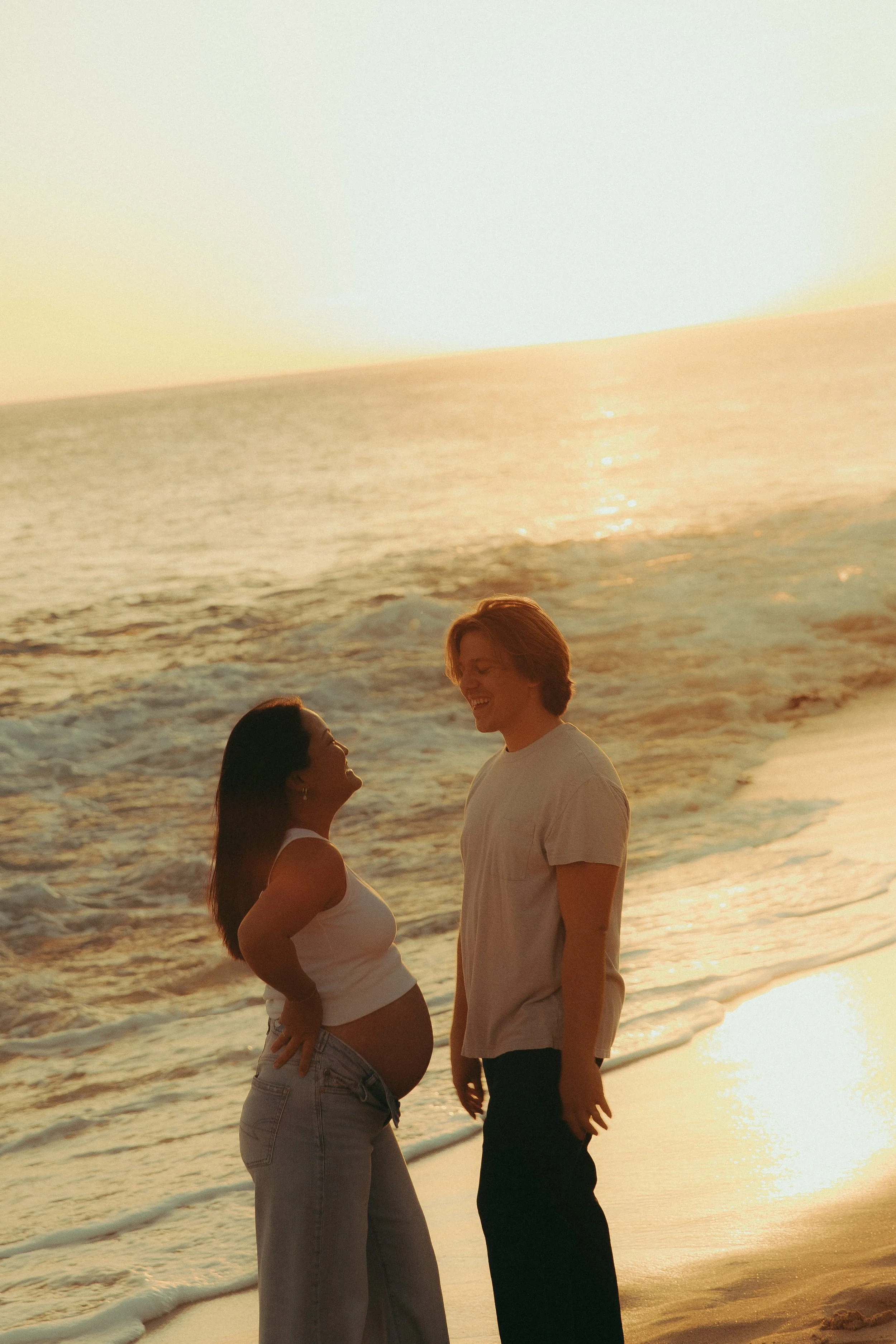 Oahu maternity photos on the beach during golden hour