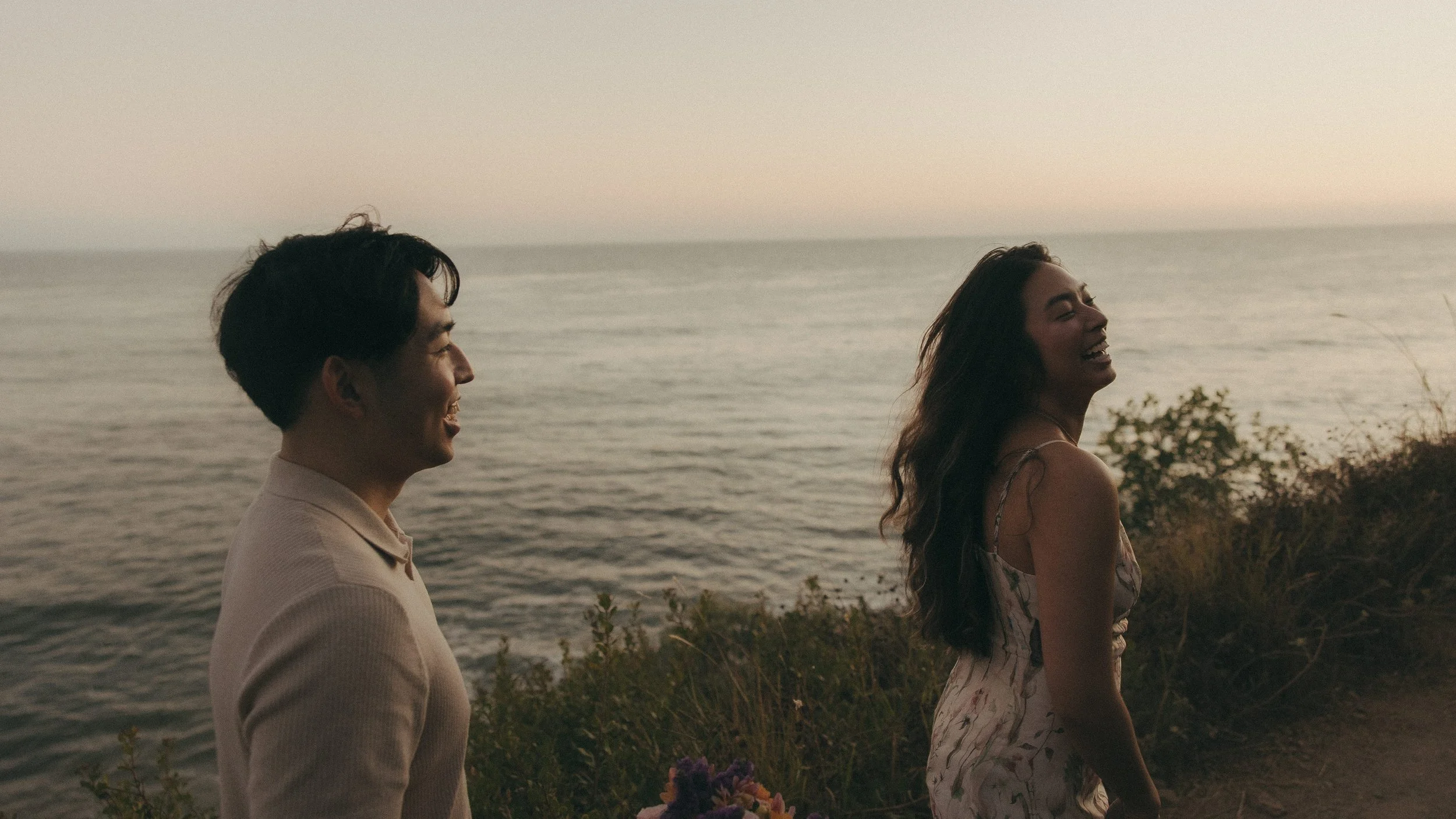 Oahu beach elopement photography with bouquet at sunset