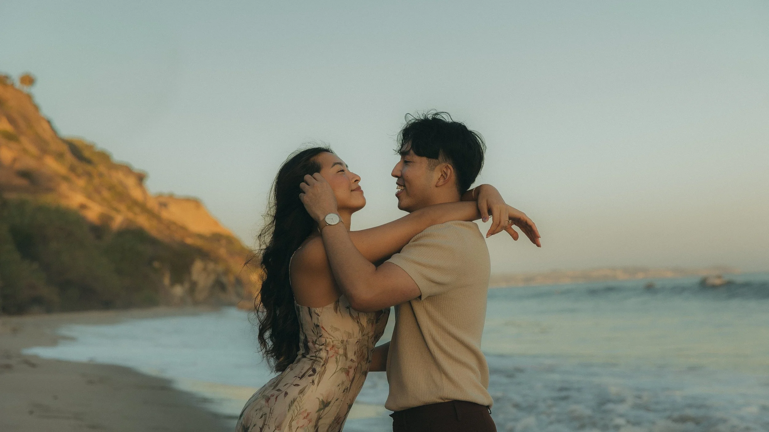 Oahu sunset couples session on rocky beach