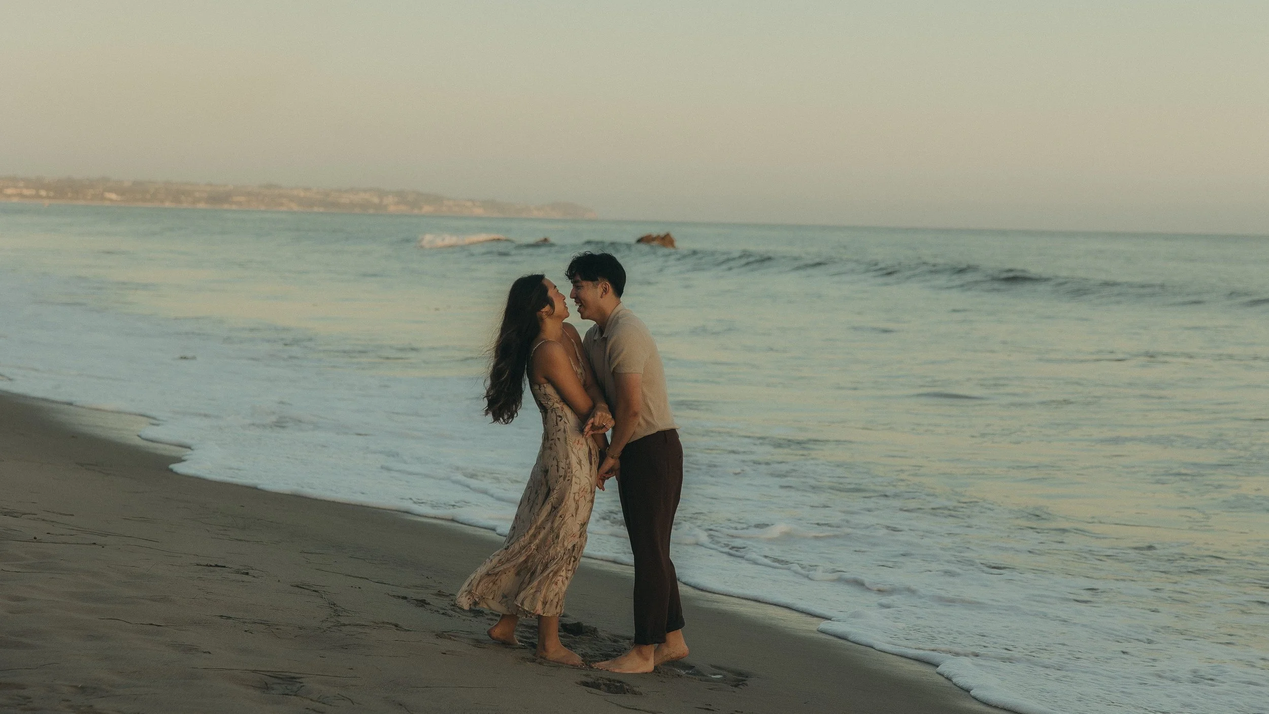 Oahu romantic couples photography near ocean waves
