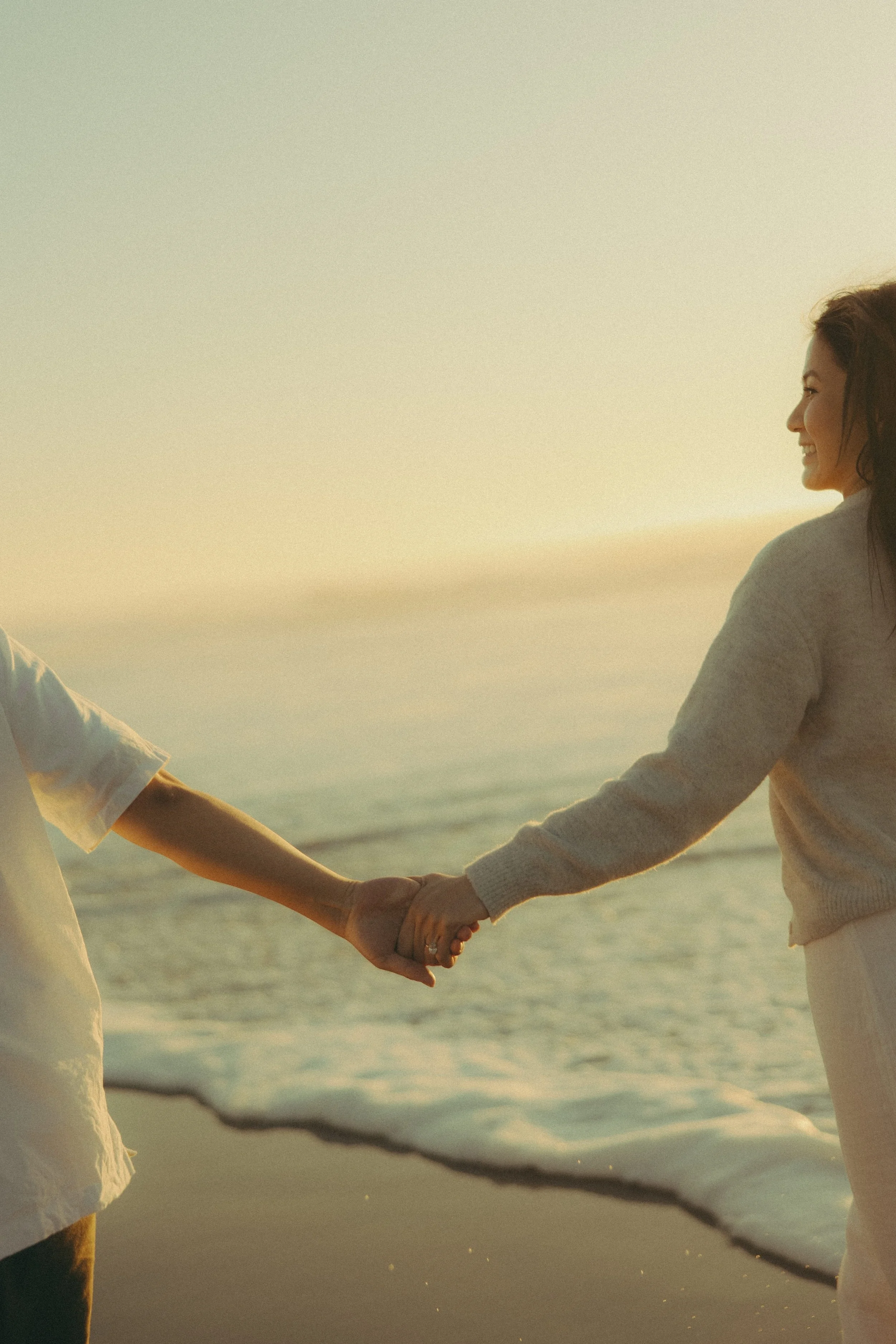 Oahu sunset couples photography by the ocean