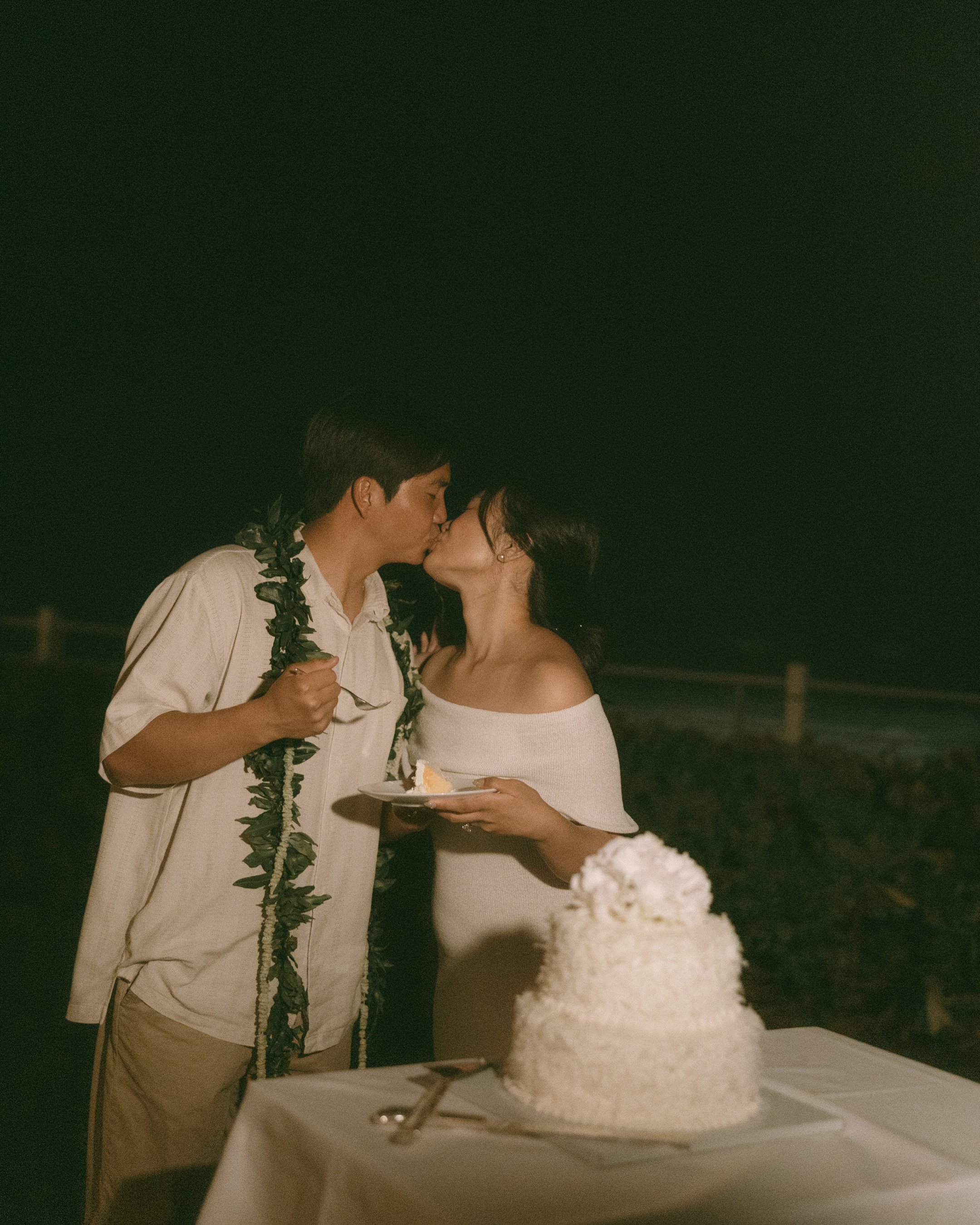Bride and groom evening portraits at Halekulani Hotel Waikiki during Oahu micro wedding photography