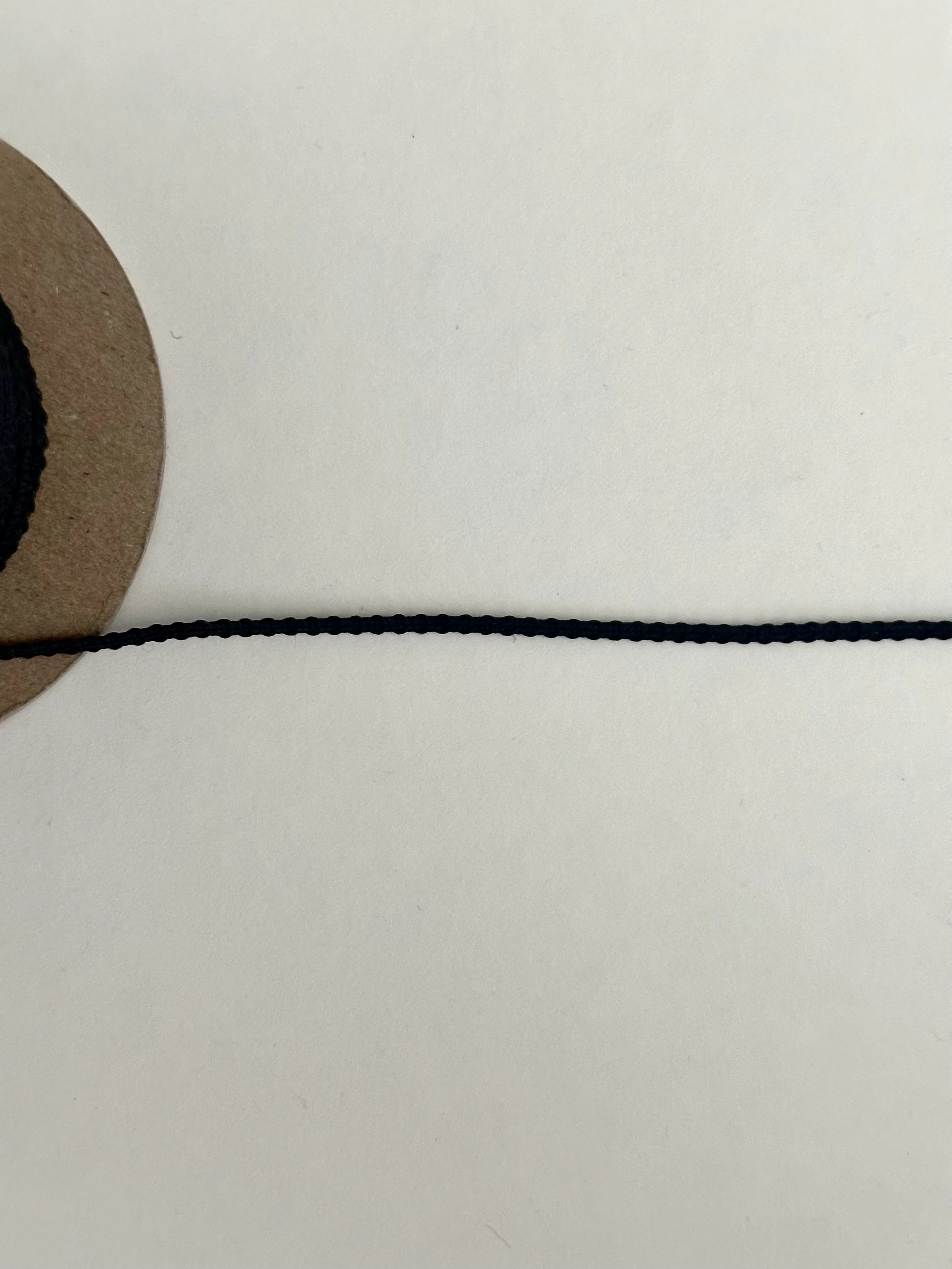 Black Narrow Trim Sold by the 1/2 yard