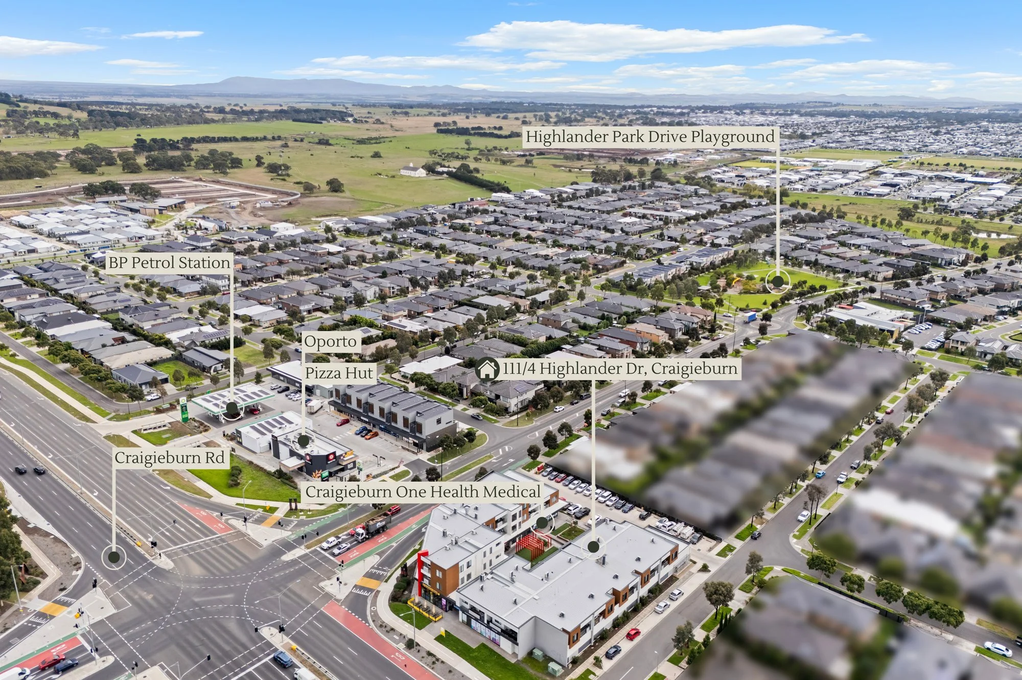 Aerial view of a suburban area with labeled landmarks including Craigieburn Rd, Craigieburn One Health Medical, 111/4 Highlander Dr, Craigieburn, BP Petrol Station, Highlander Park Drive Playground, and Oporto, with residential houses, roads, and a park visible.