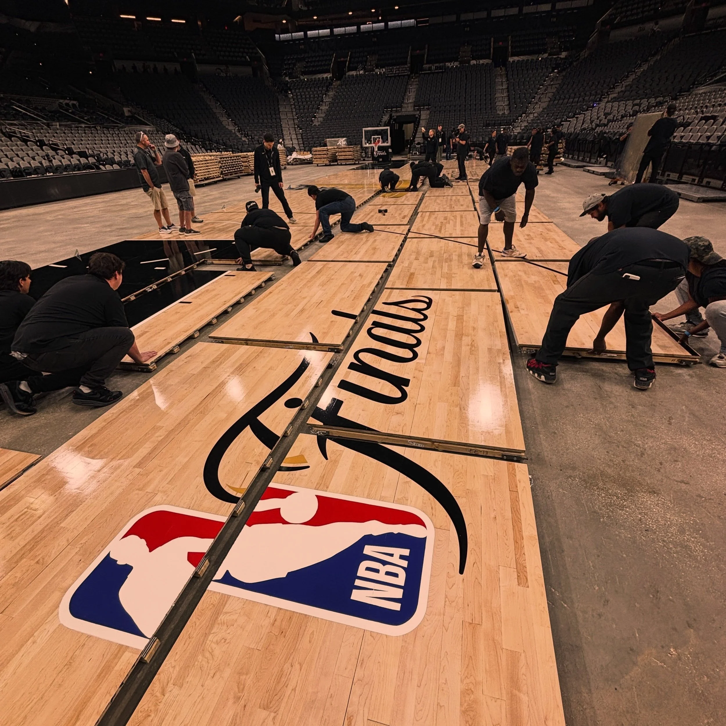 Got up early to shoot the Finals court install at Spurs stadium for the NBA. Came in on pallets and snapped together like a puzzle.
