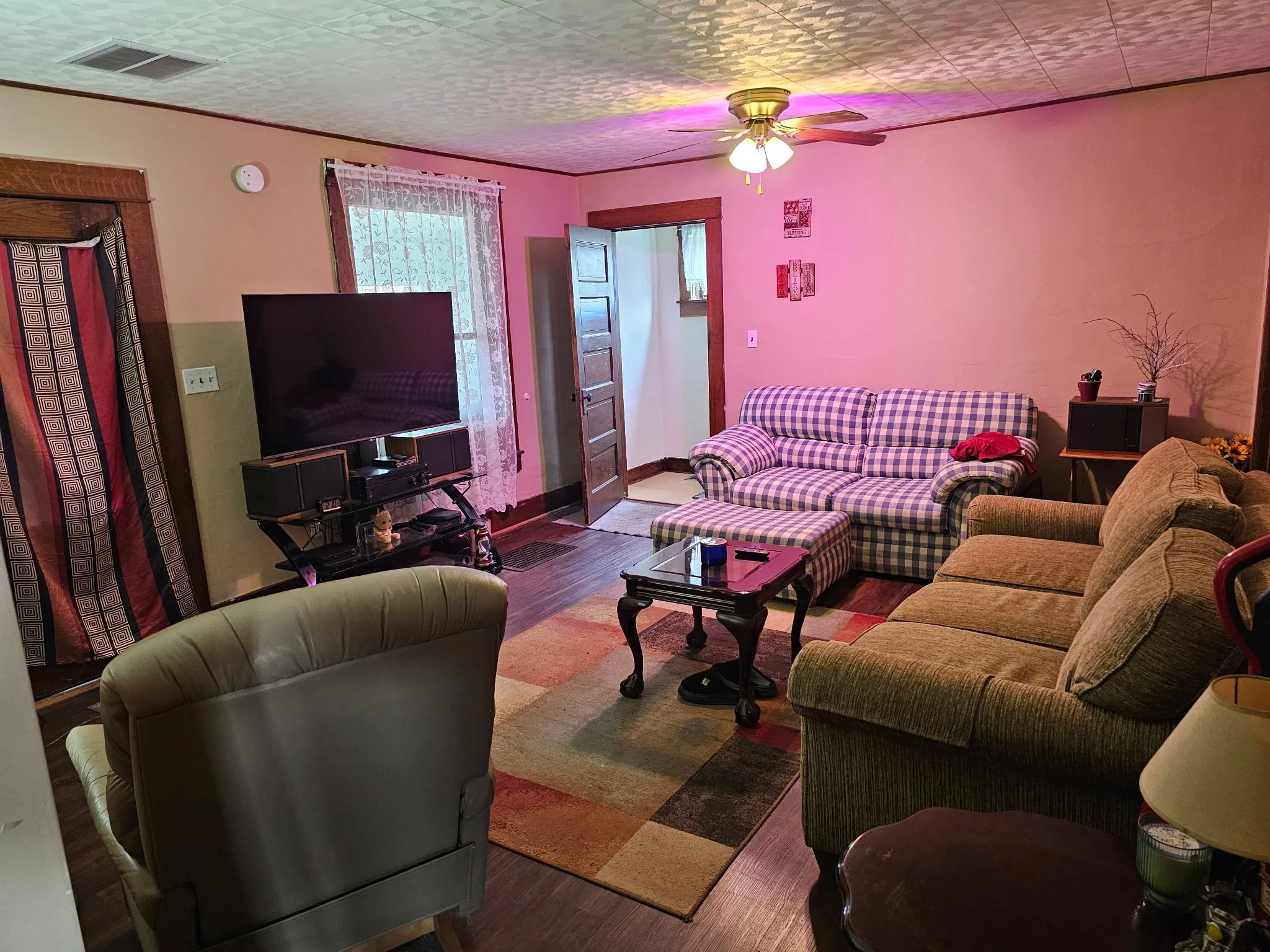 The living room for the guys to hang out or have house meetings.