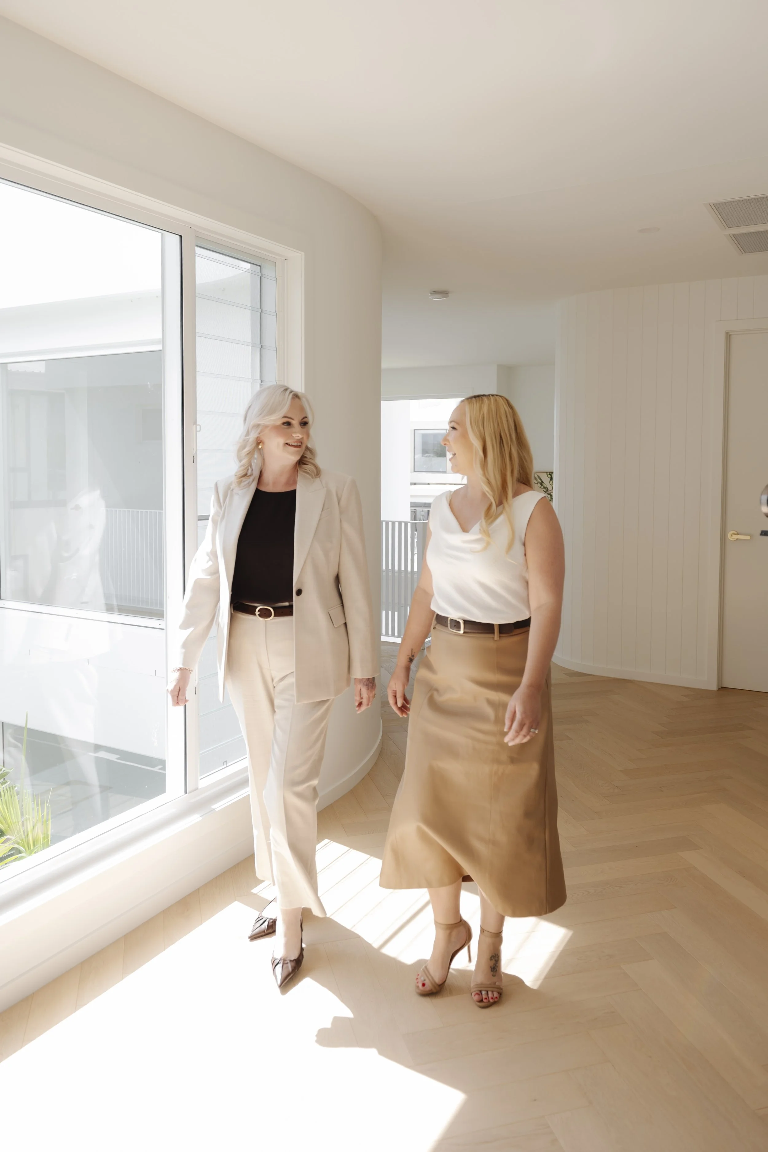 therapist and patient walking together