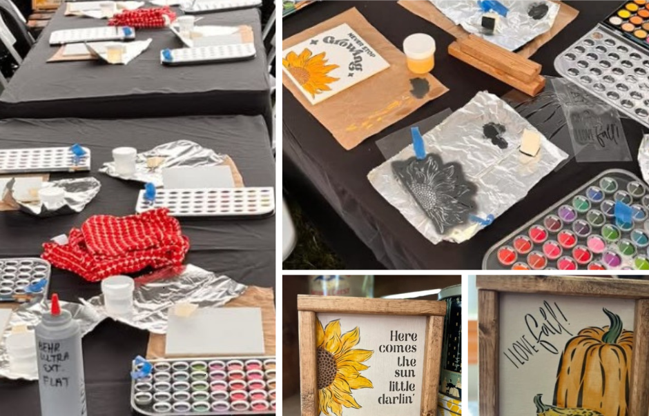 paint class setup of tables with paint and canvases as well as a painted sunflower sign and pumpkin sign