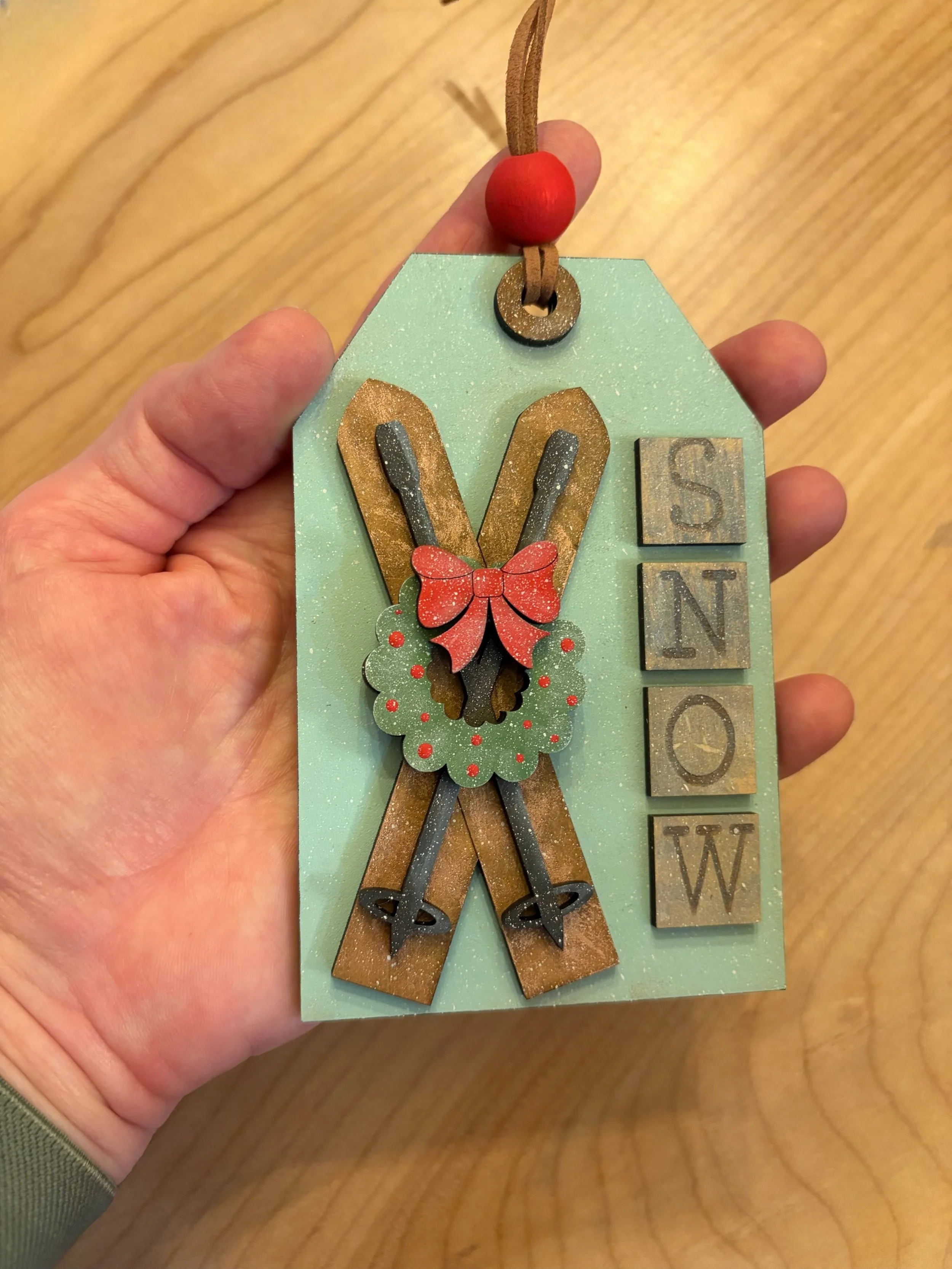 Ornament skis hand.JPEG
