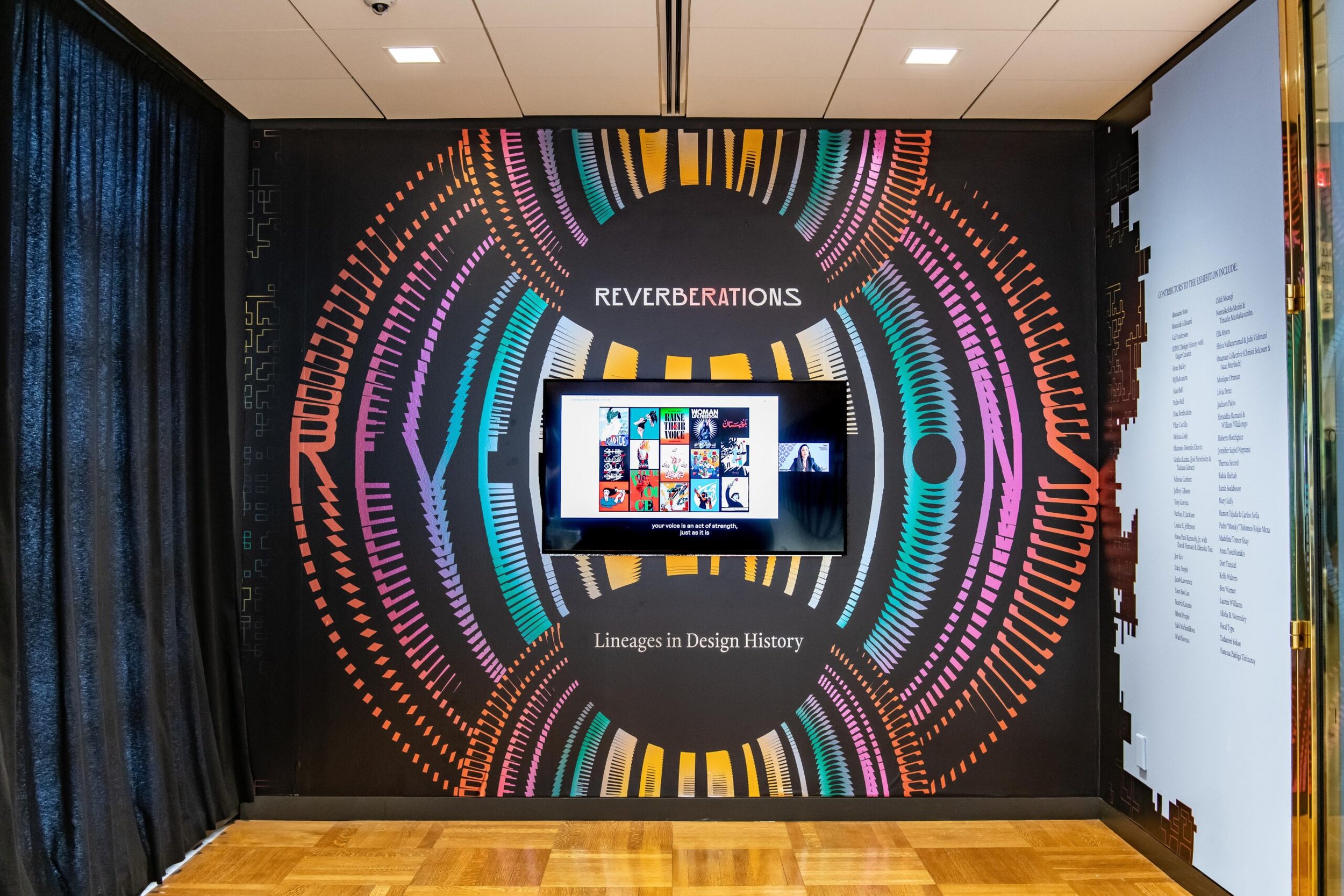Exhibition wall with digital display and colorful geometric patterns, titled 'Reverberations: Lineages in Design History'.