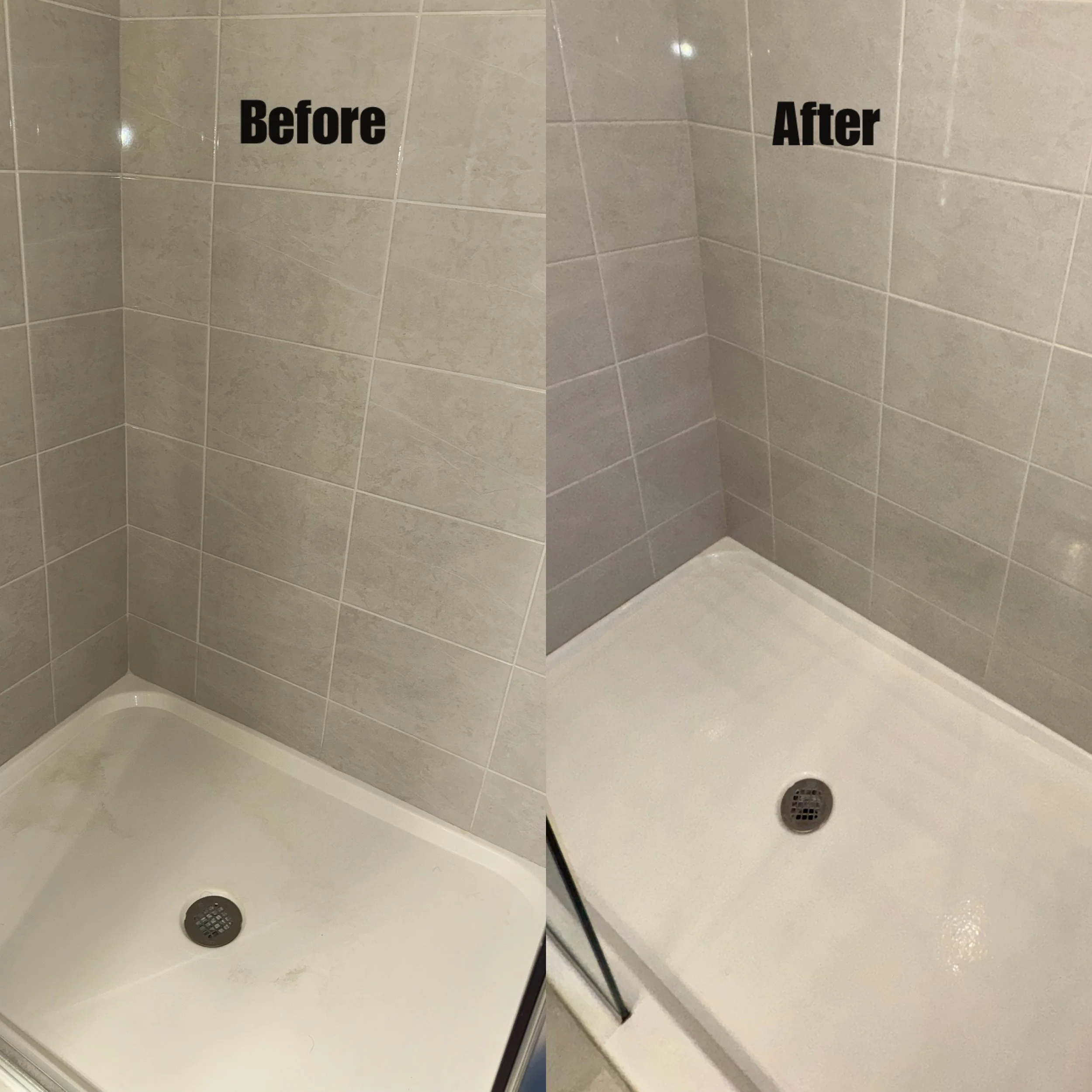 A bathroom corner with beige tiled walls and floor, a white shower with a black shower hose, and a round drain in the shower floor.