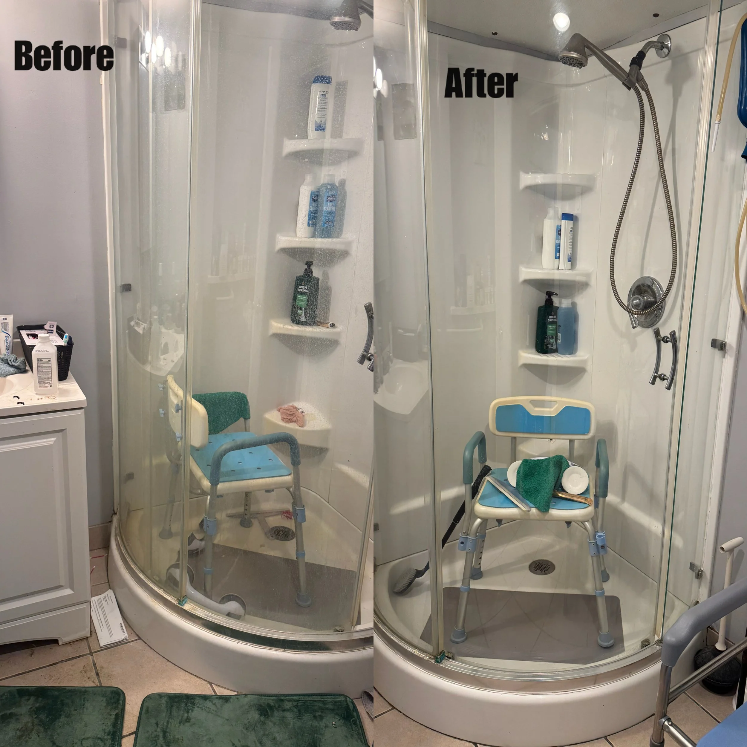 A foldable shower chair with a green towel and a pink cloth placed on it inside a shower stall. The shower area has a sliding glass door, a shower head, and shelves with toiletries. The bathroom has beige tiled flooring and walls.