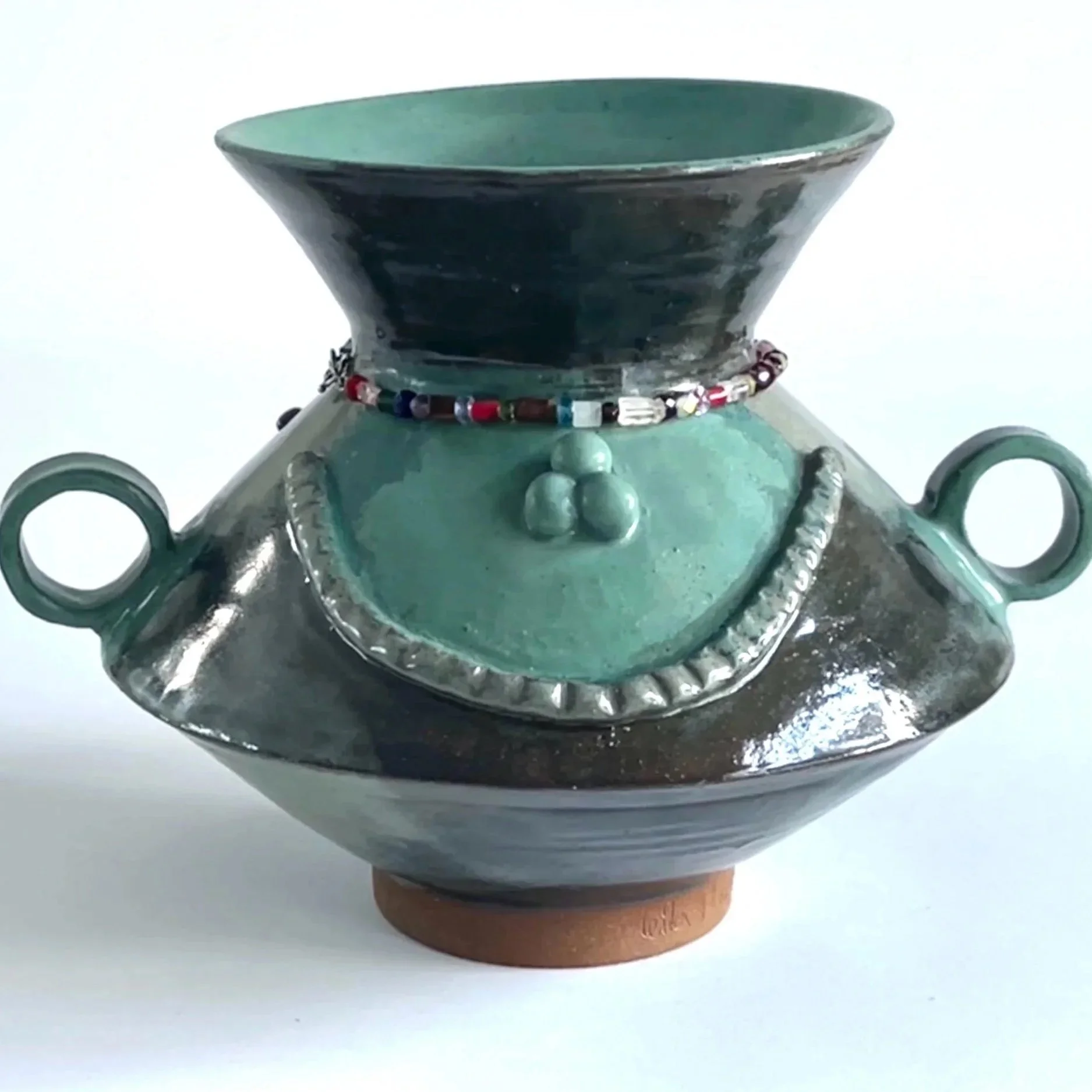 Mistress Adorned. 19x20x20 cm 
Wheel thrown and altered