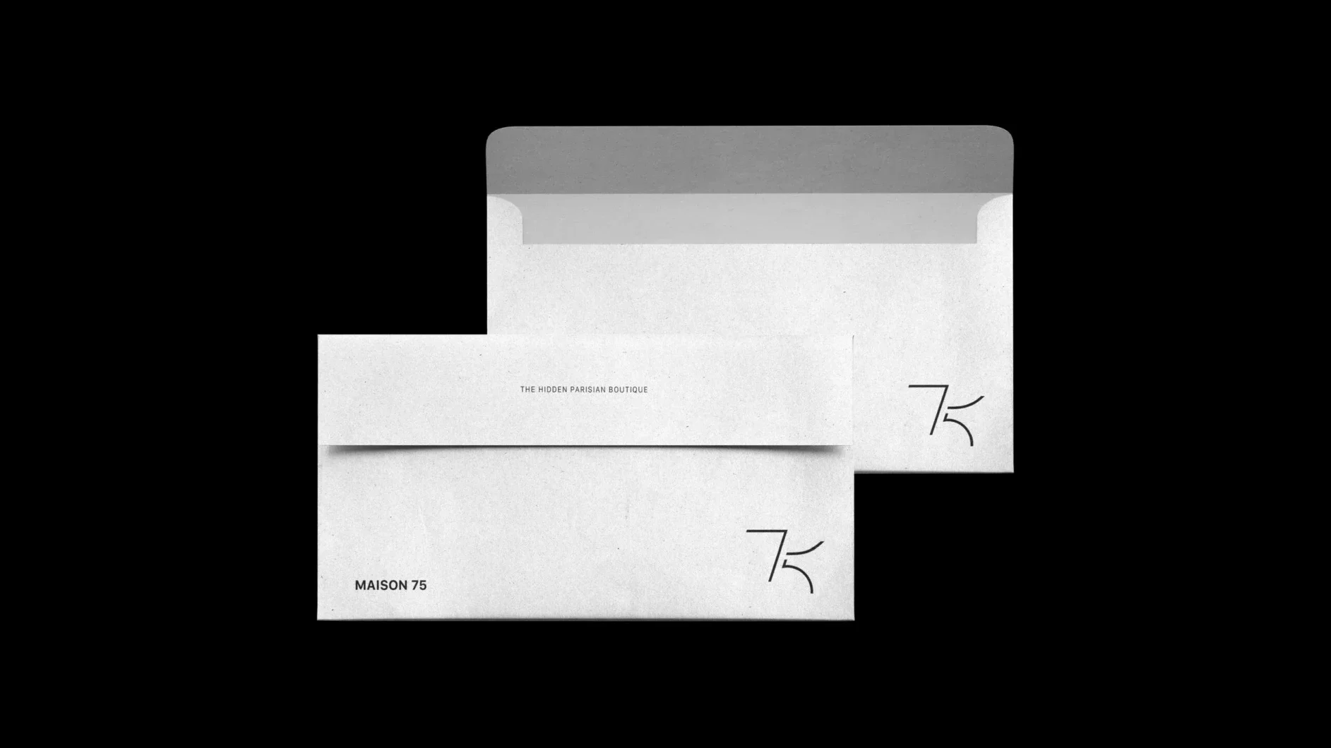 Maison 75 branded envelopes featuring the brand tagline The Hidden Parisian Boutique.