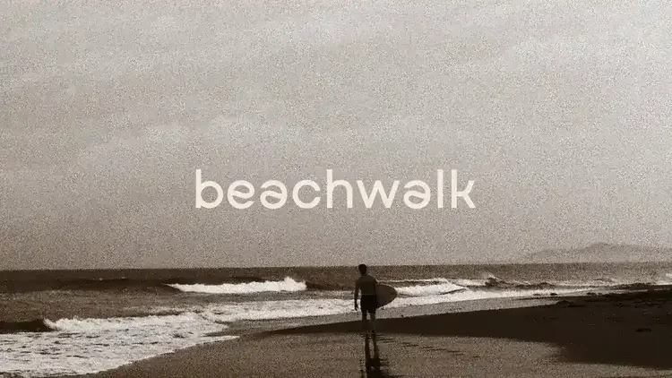 Beachwalk real estate brand identity cover featuring a surfer walking on the shore with Beachwalk logo on top designed by Firma Brandt in Panama.
