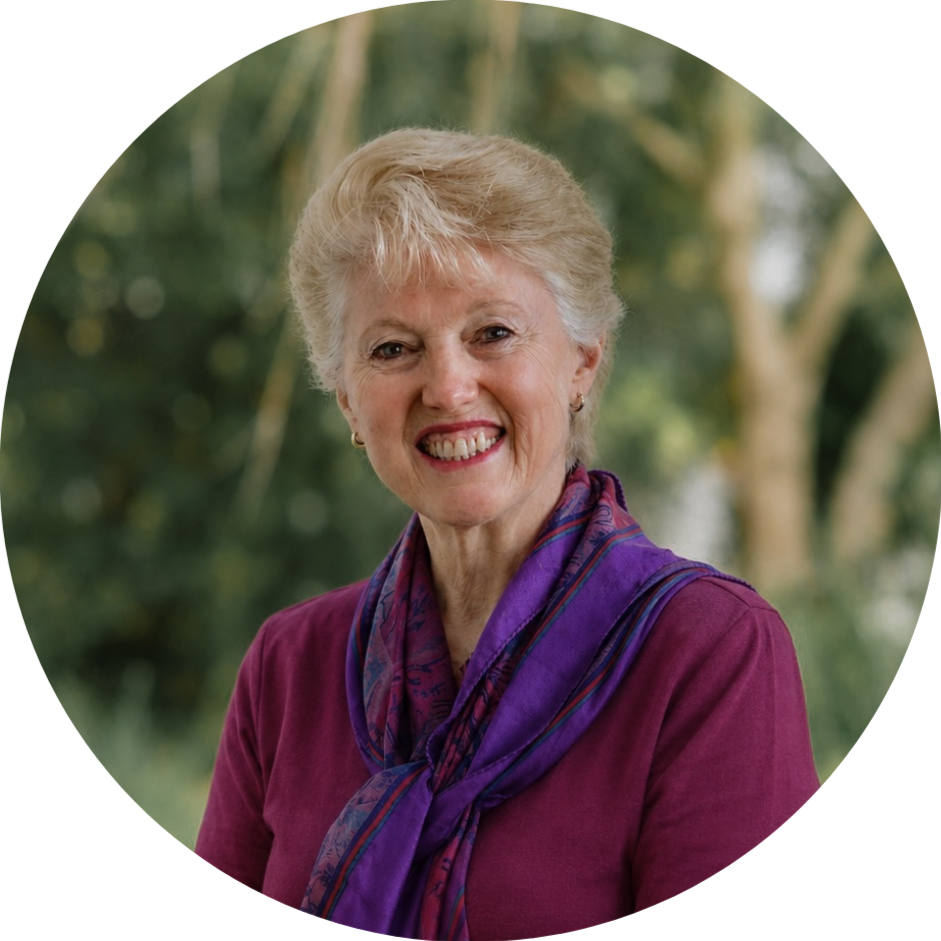 Lady in her sixties wearing a red top