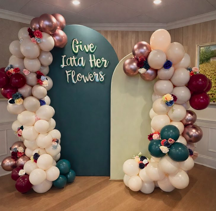 custom backdrop with floral balloon garland