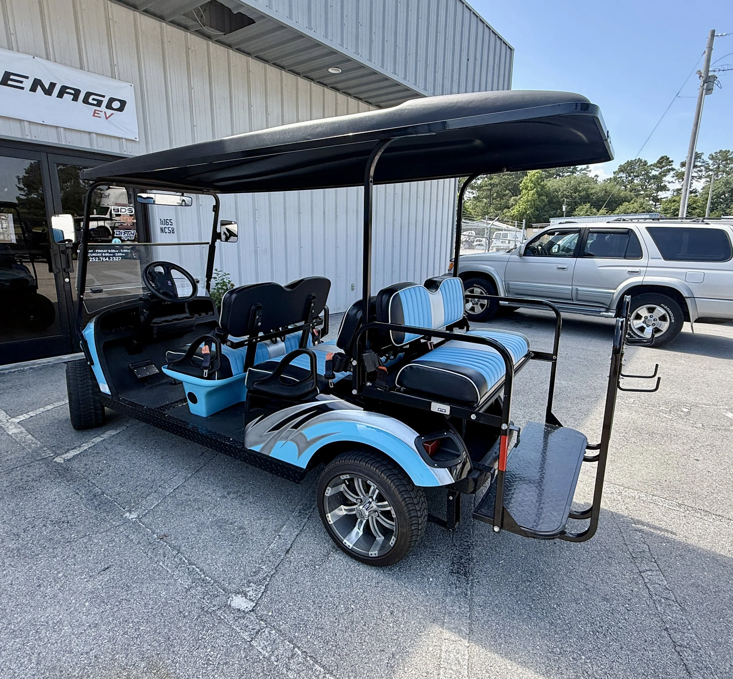 Blue and black golf cart (LSV)