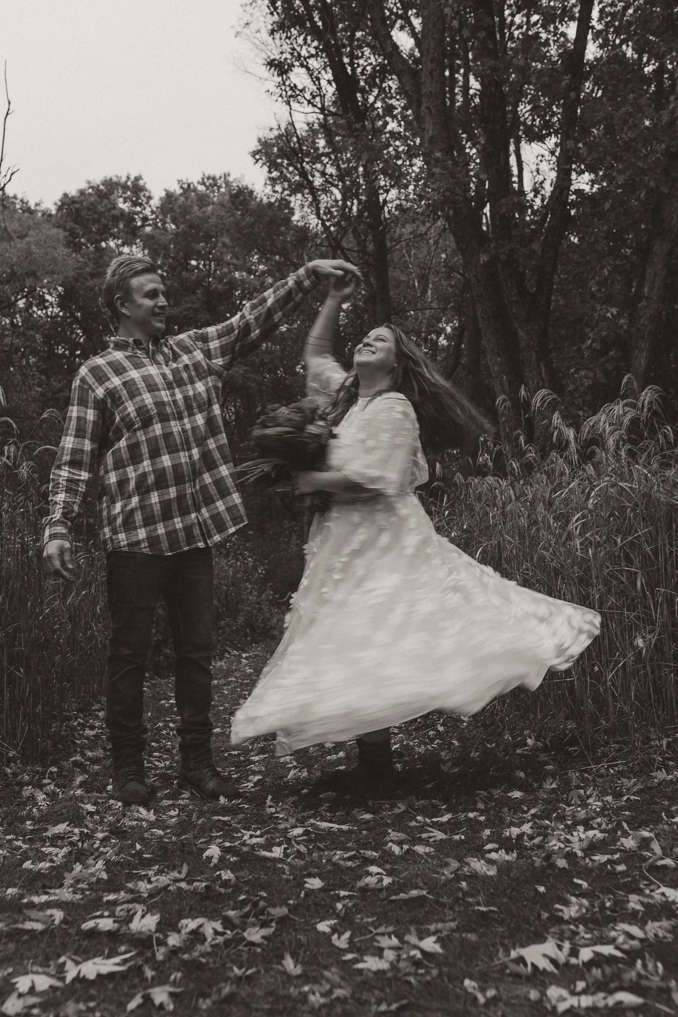 Groom spinning bridePine city minnesota wedding photography 