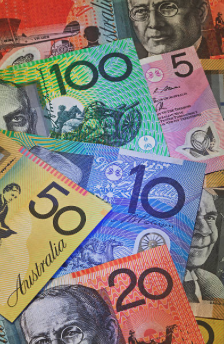 Australian banknotes including $100, $50, $20, $10, and $5 notes.