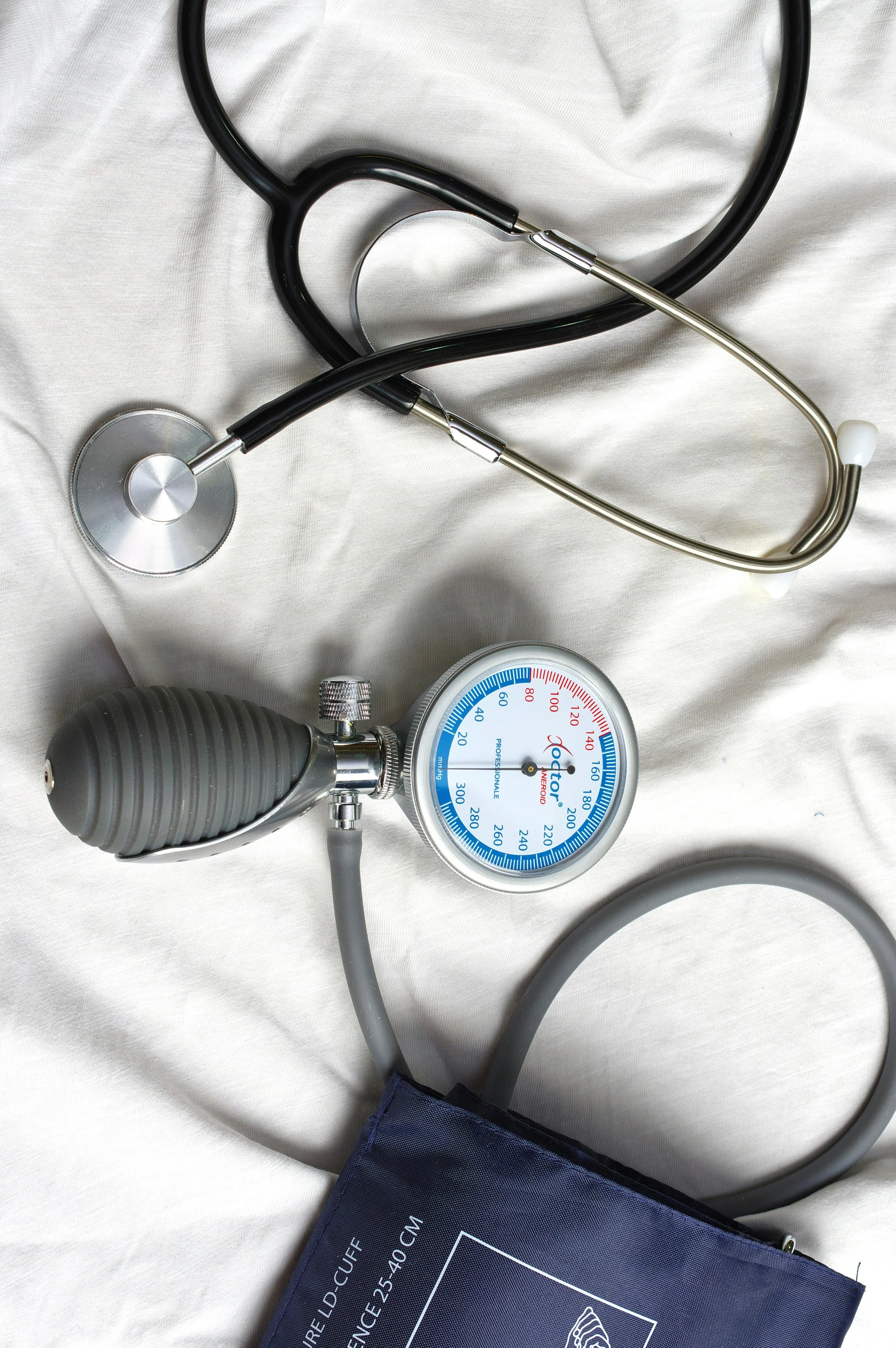 Basic life support medical equipment including blood pressure cuff and stethoscope used by EMTs at event medical standby.