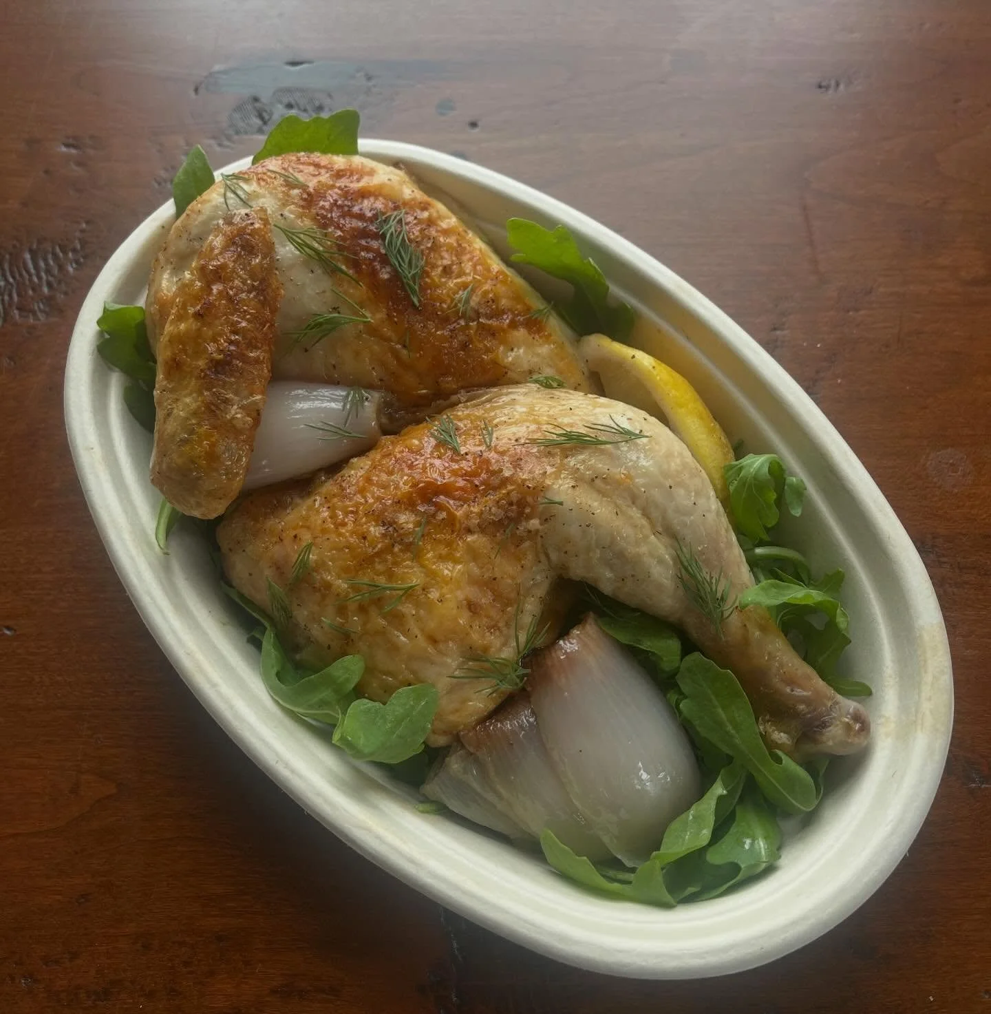 Stop by for lunch (or dinner!) to enjoy our weekly special. Half a house roasted organic chicken with caramelized shallots and lemon 🍋