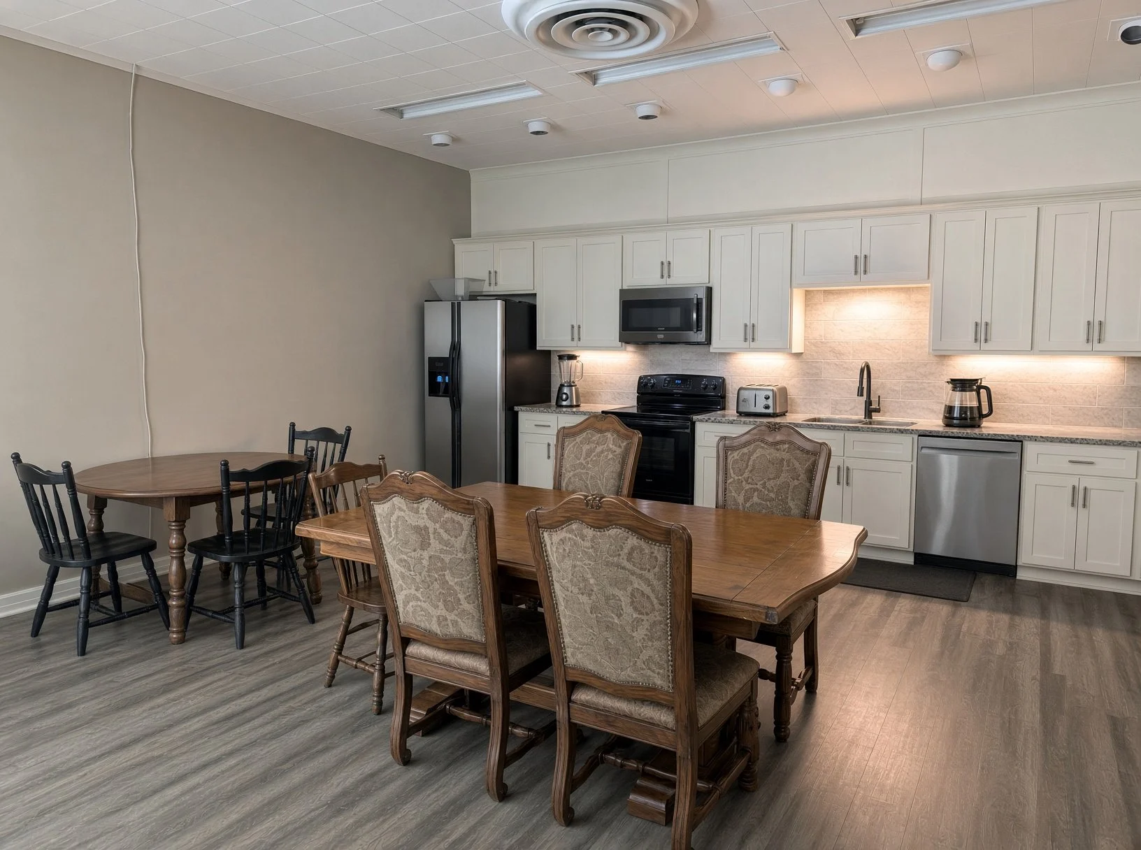 Kitchen and dining area at Wolf on Main sober living home