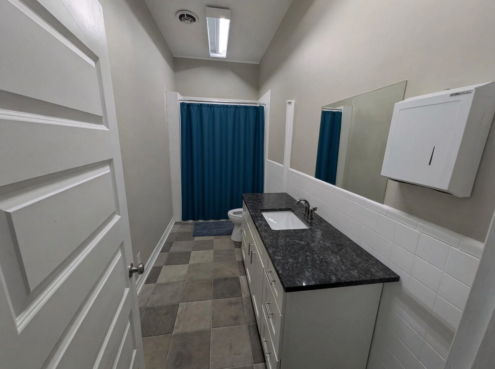 Full bathroom at Wolf on Main sober living home