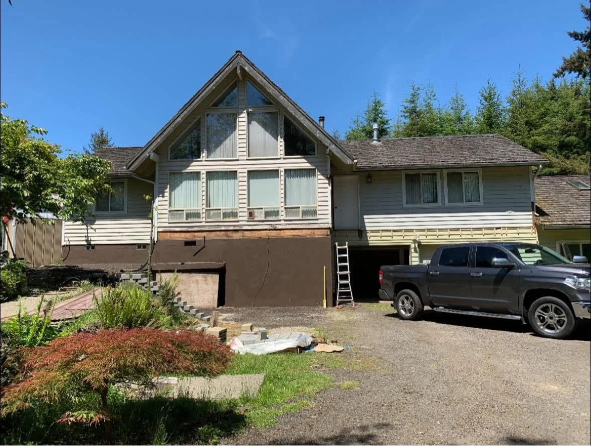 Oranssi technician working on a roof project