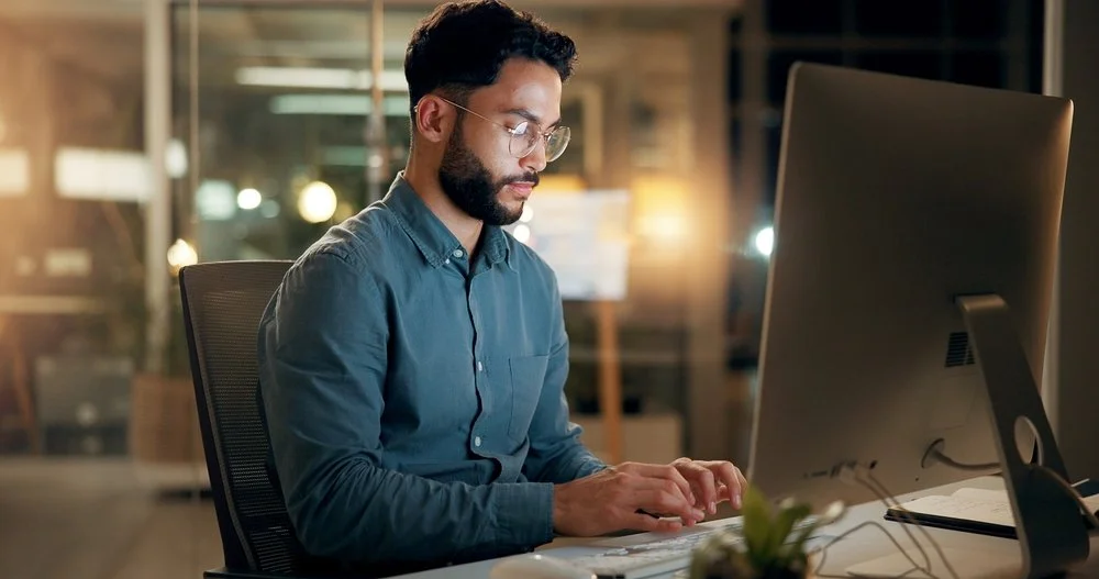 IT professional managing a business email migration service including DNS configuration and data transfer for a Lower Mainland company