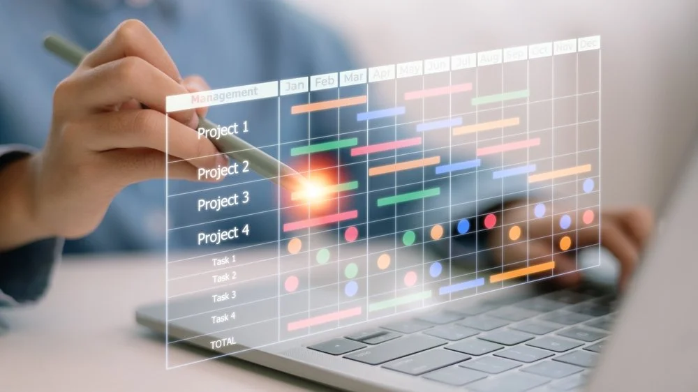 Small business team working with an IT project management services provider to plan a Microsoft 365 migration and infrastructure upgrade