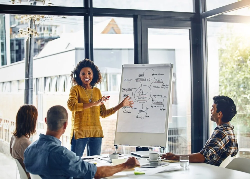 IT project management services professional reviewing a project timeline and network setup plan for a Lower Mainland small business