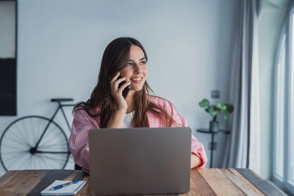 Business owner comparing a business internet provider plan with a Gennix consultant in a Lower Mainland office