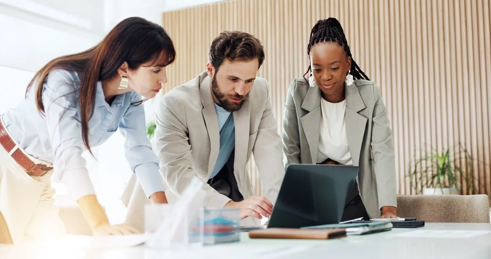 Business owner and IT project management services team completing a server migration and office network setup in Vancouver