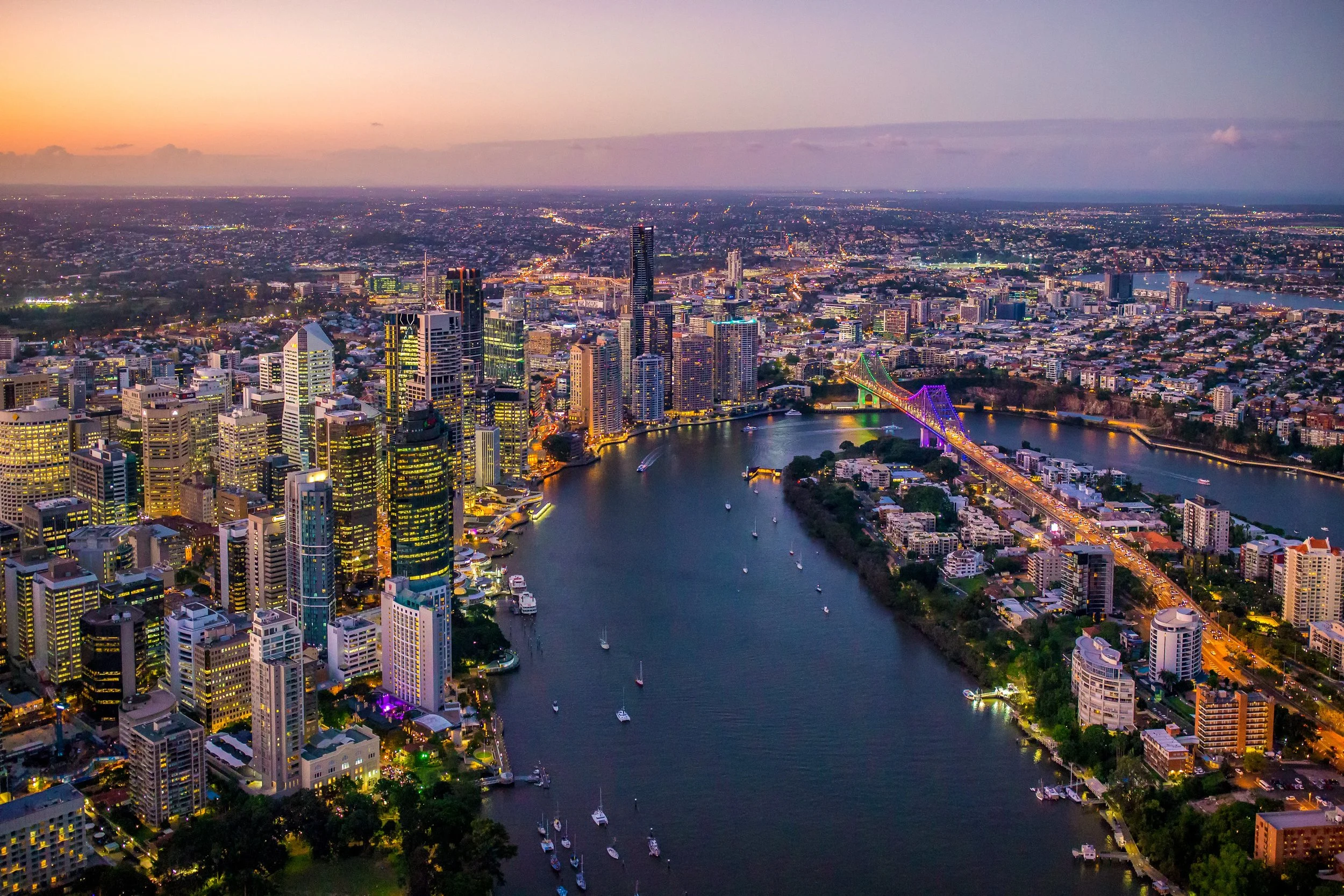 Lights of Brisbane City, Brisbane River and surrounds at dusk.