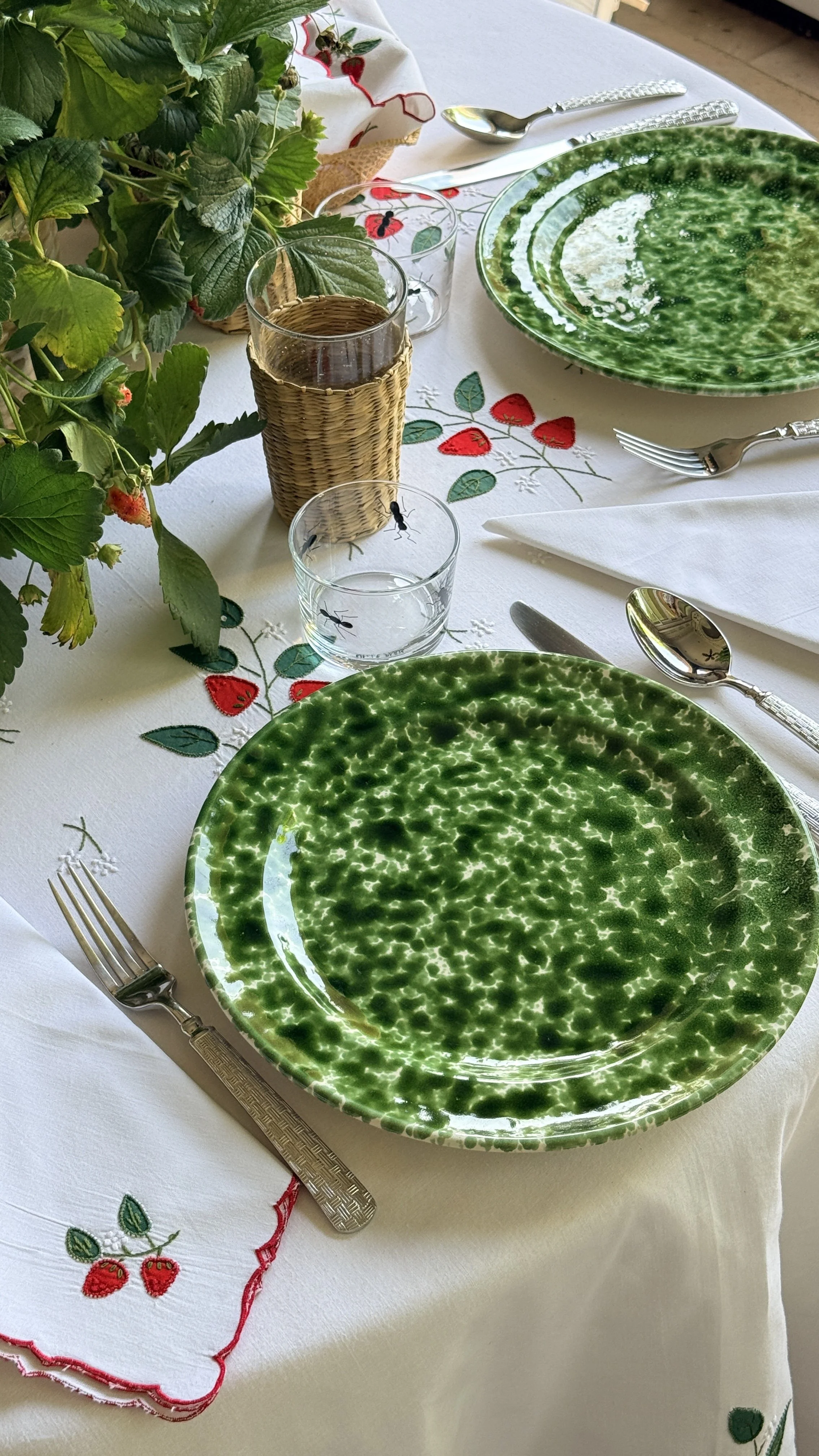 Green Plateware, Strawberry embroidered tablecloth, and strawberry napkins