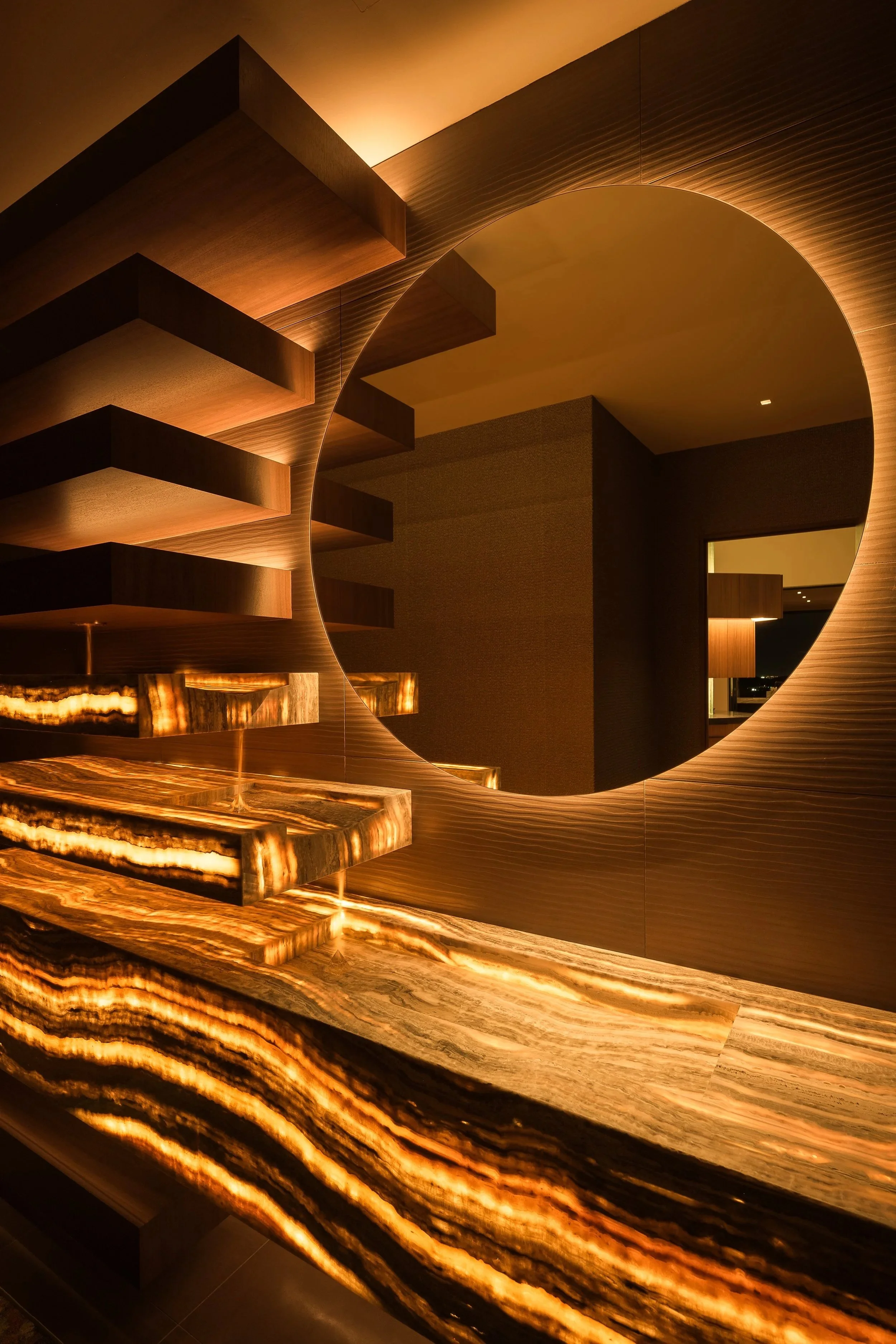 powder room with back lit onyx waterfall faucet