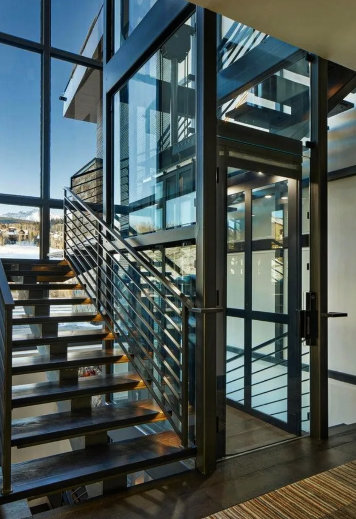 glass elevator in glass entry