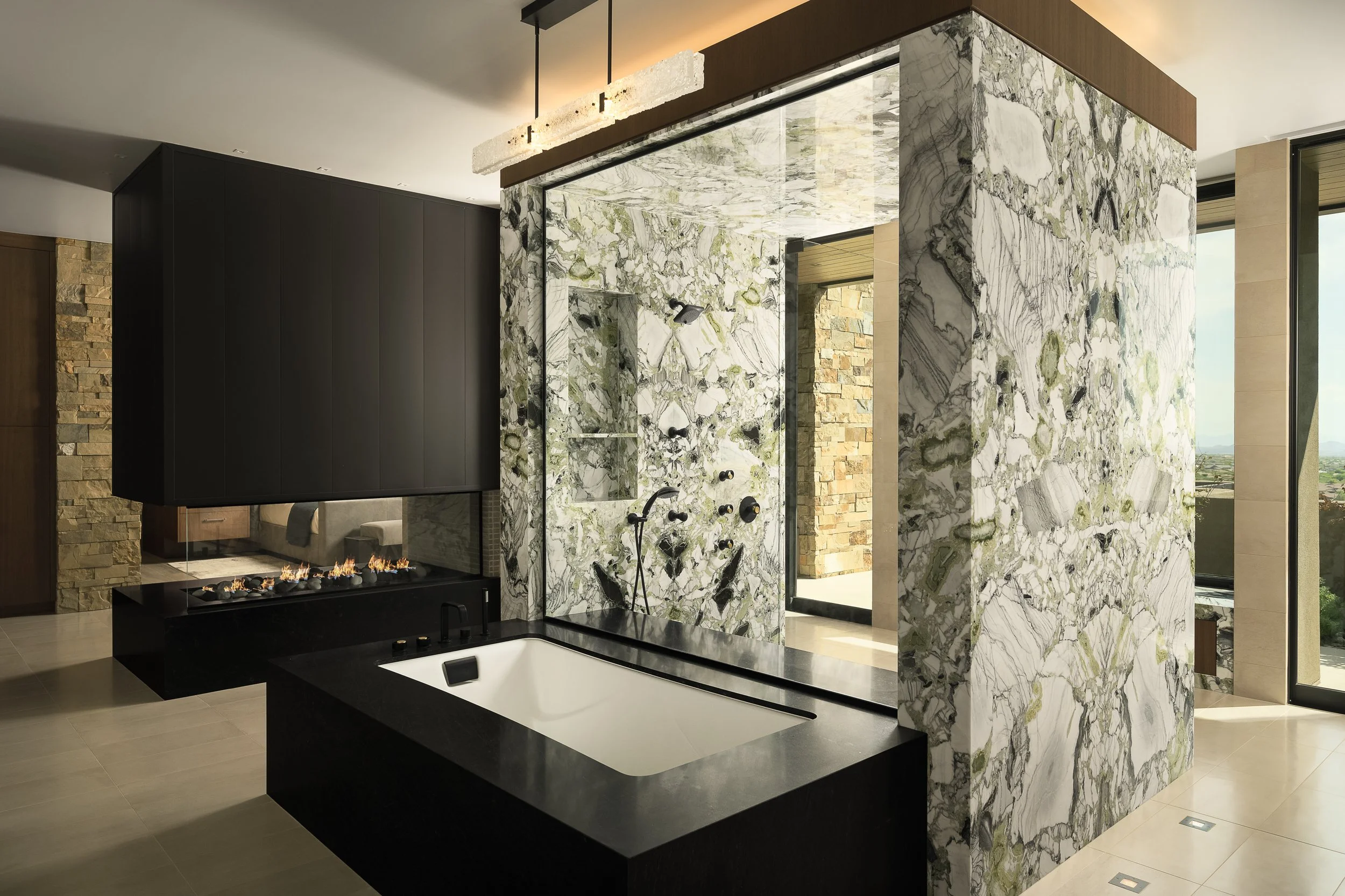 Master bathroom architectural shower green marble walls