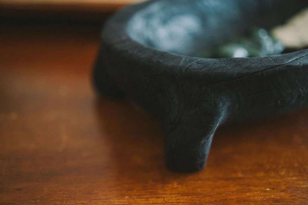 Pounamu Hei Tiki carved by  Whalebone Hei Tiki
