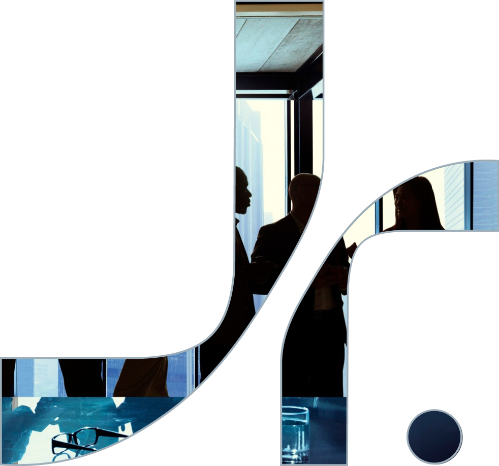 Silhouettes of three business professionals having a discussion inside a modern office with large windows and city views.