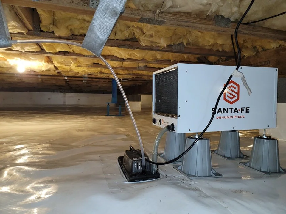 AllPro Crawlspace encapsulation installation with a Santa-Fe Dehumidifier.