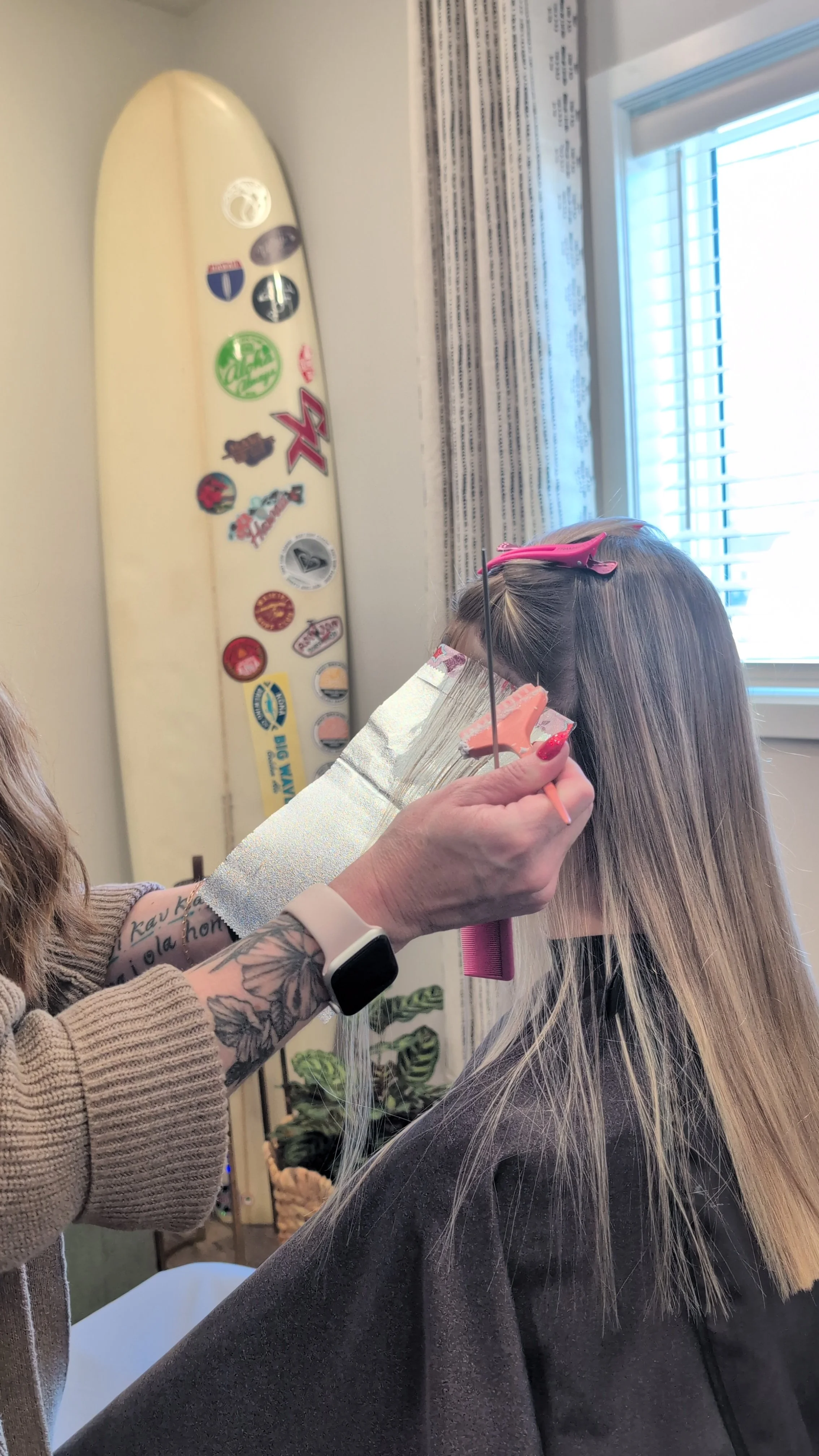 Missy Nelson in action coloring a client's hair in Red Wing, Minnesota