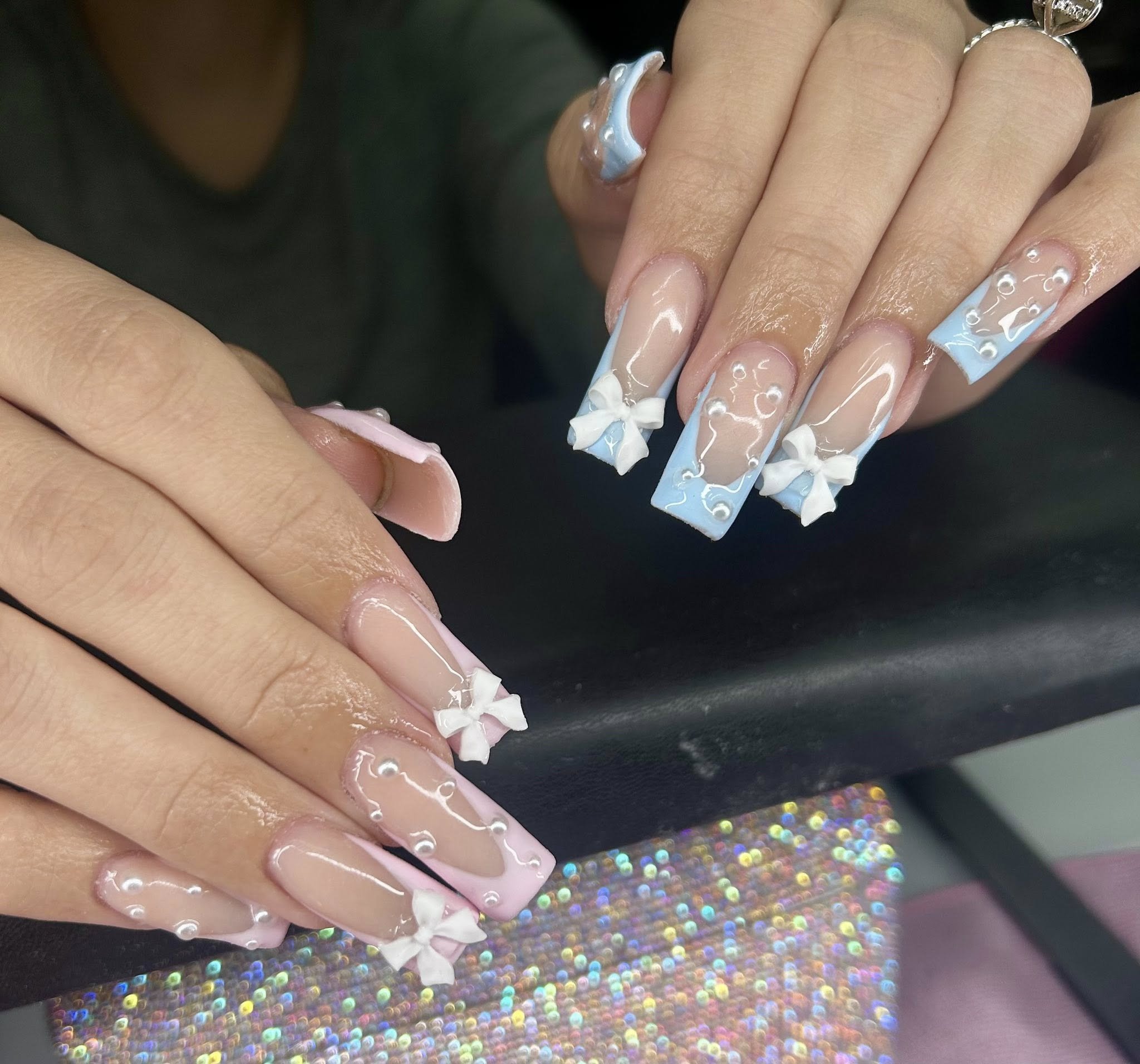 nail art design by Ellie Denzer. Bows, gems, acrylic nails