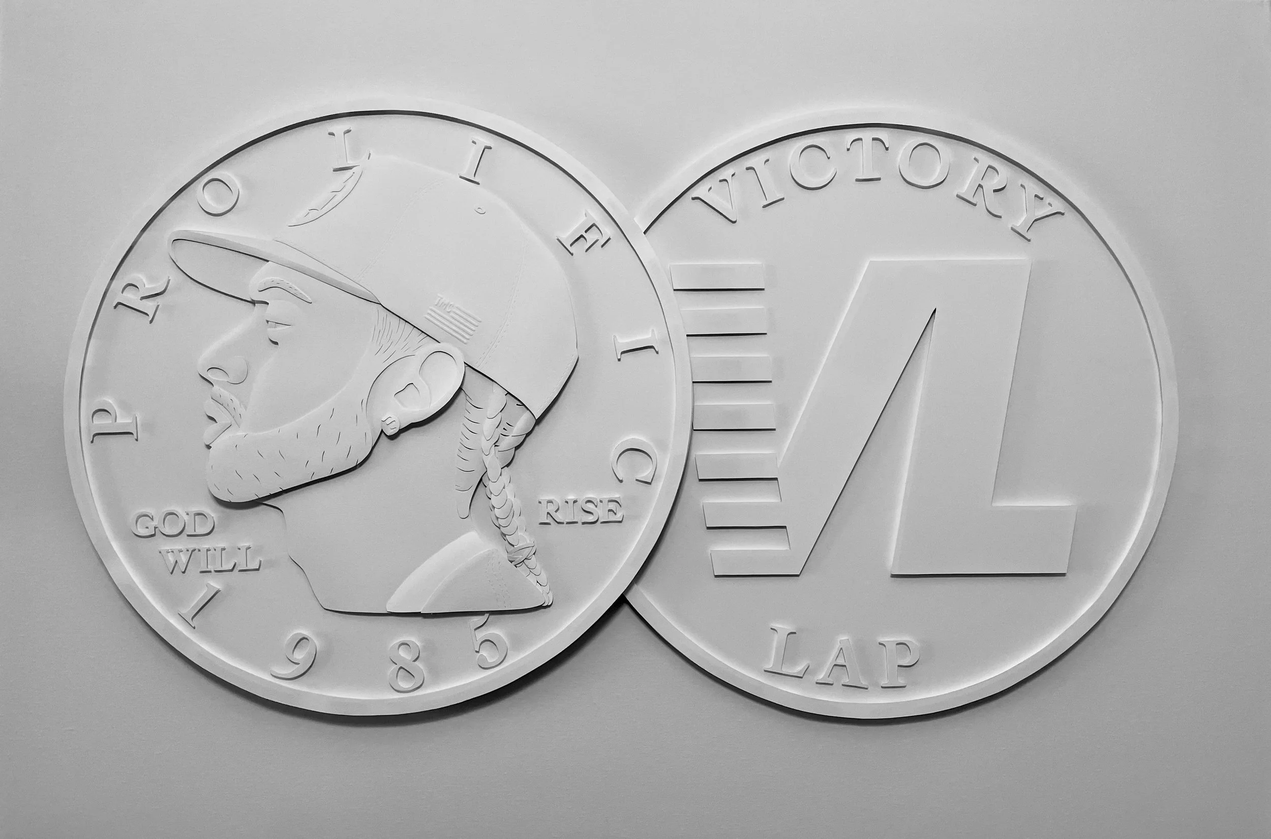 Paper sculpture of a coin paying tribute to Nipsey Hussle