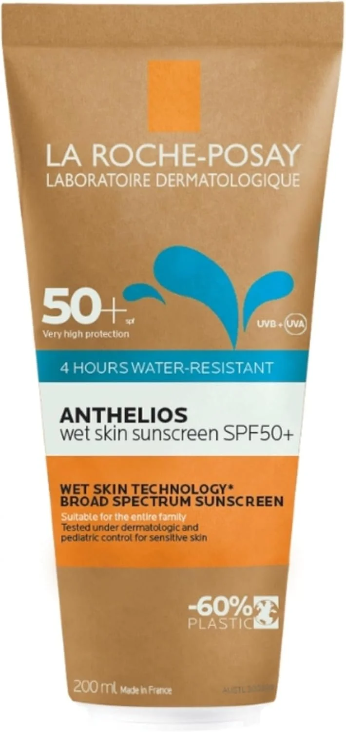 A bottle of La Roche-Posay Anthelios wet skin sunscreen with SPF 50+ for very high protection, water-resistant for 4 hours, designed for sensitive skin, with broad spectrum protection and wet skin technology.