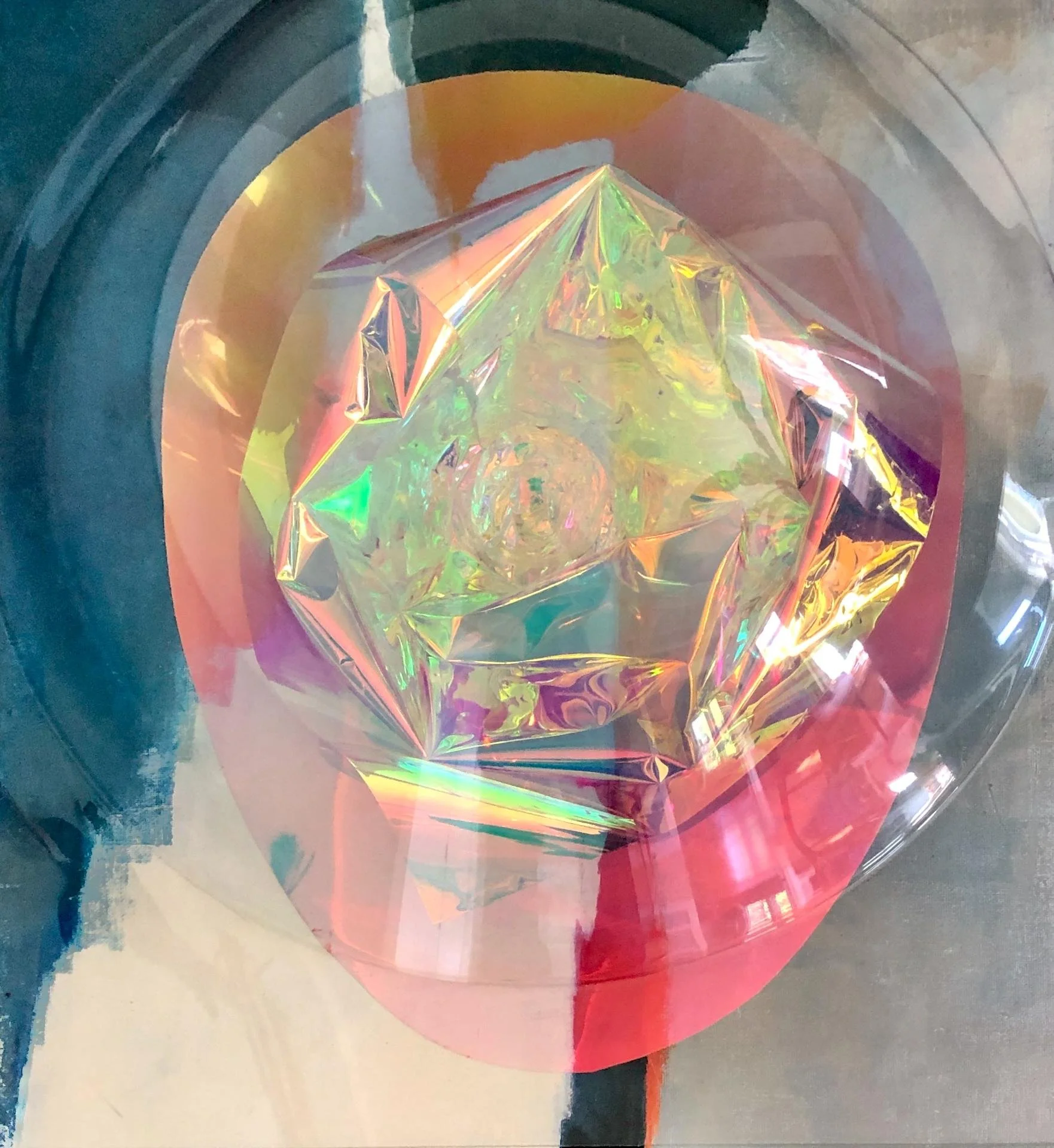 "Morphing iridescence: One Bubble, so many backgrounds" | 2026 | Iridescent foil, acrylic vacuform bubble | 24" x 24" x 12"