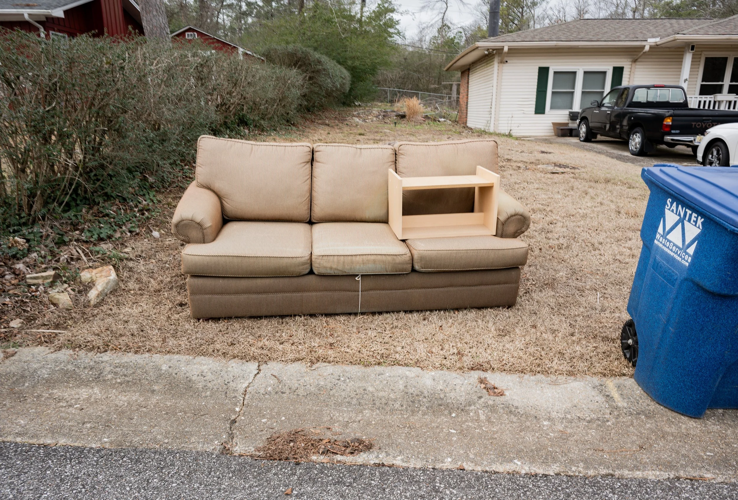 The couch at the end of the street.

This was the first time I walked outside of my house.
Without a boot on.
Just in my regular tennis shoes, determined enough to limp down the street in pain to take a photo.

Sums up photographers in a way - always